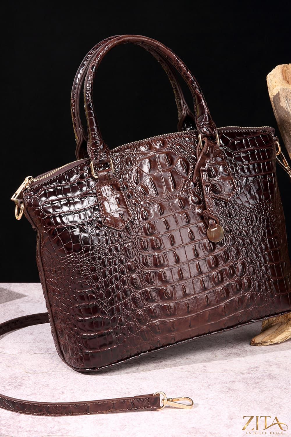Zita La Belle Elite PU leather handbag with gold hardware, featuring a structured design and top handle for stylish carry.