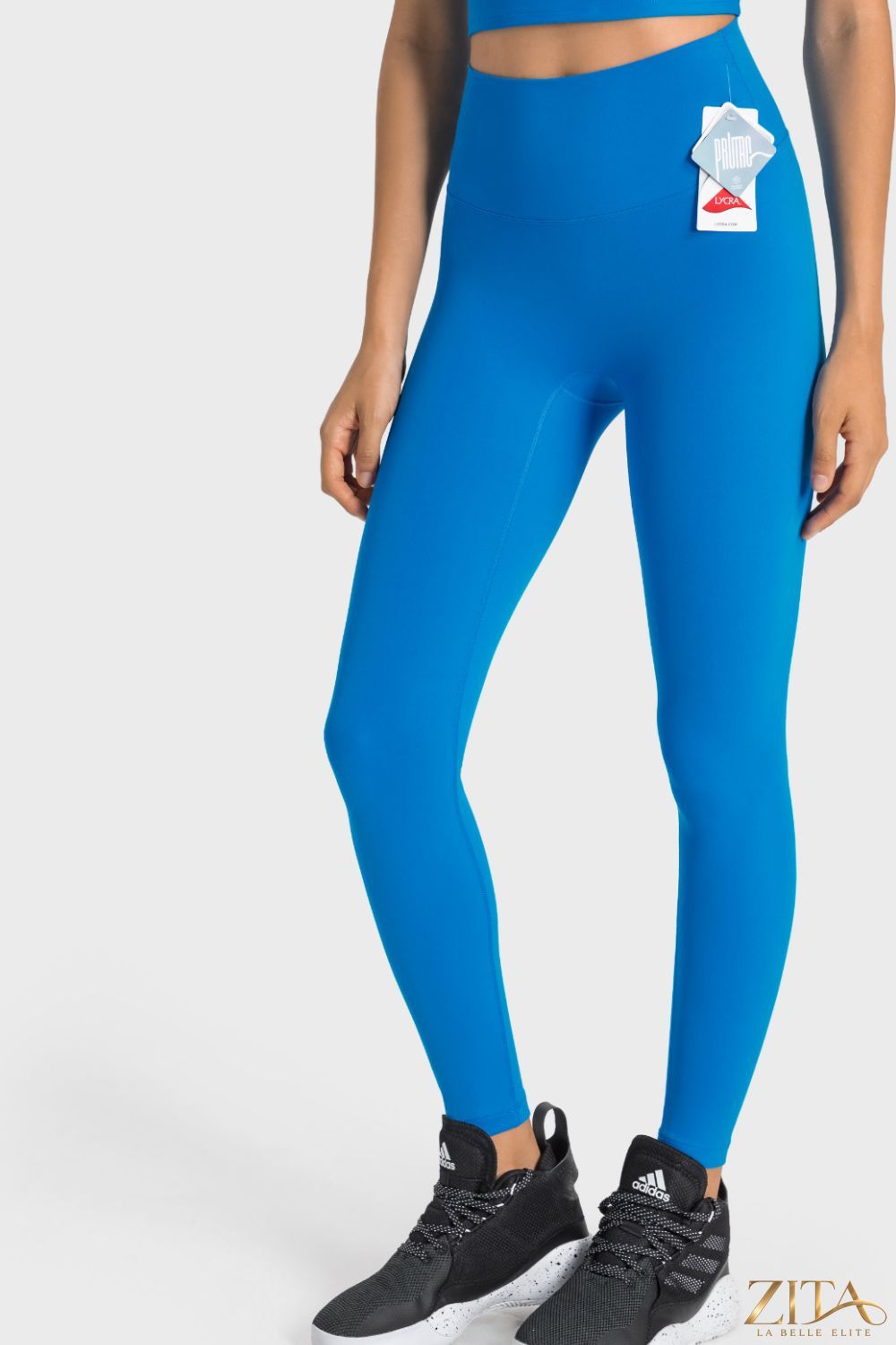 Millennia high-rise wide waistband yoga leggings in black, stretchy fabric with a smooth fit and comfortable design.