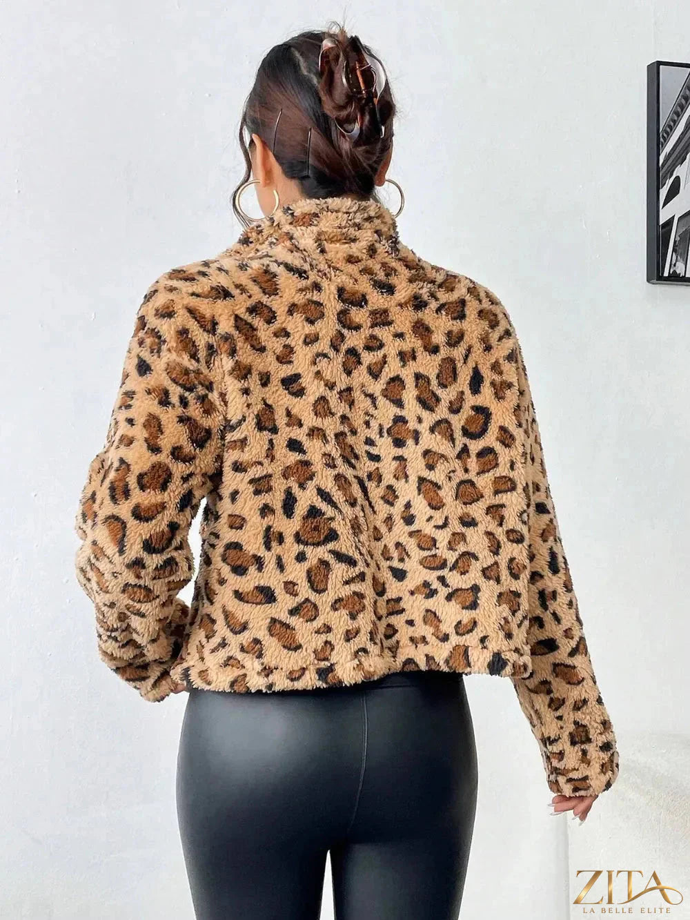Fuzzy leopard print turtleneck zip-up jacket by Trendsi featuring a cozy, stylish design and a front zipper closure.