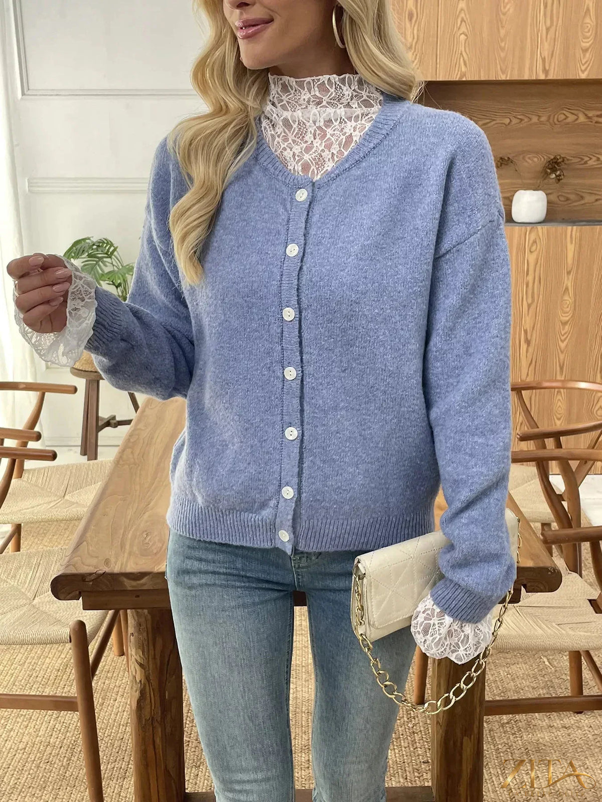 Zita La Belle Elite button-down cardigan with delicate lace trim, showing soft knit fabric and elegant lace details on the collar and cuffs.