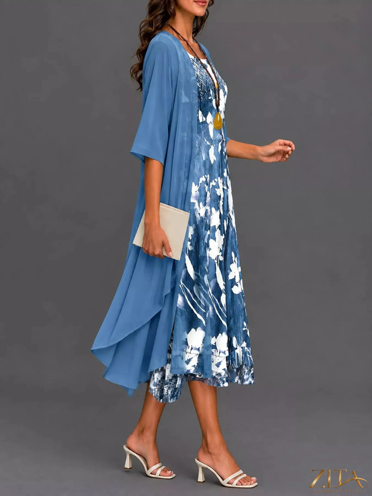 Plus size floral print midi dress with chiffon cardigan set by Zita La Belle Elite, shown on a model in a full-length view.