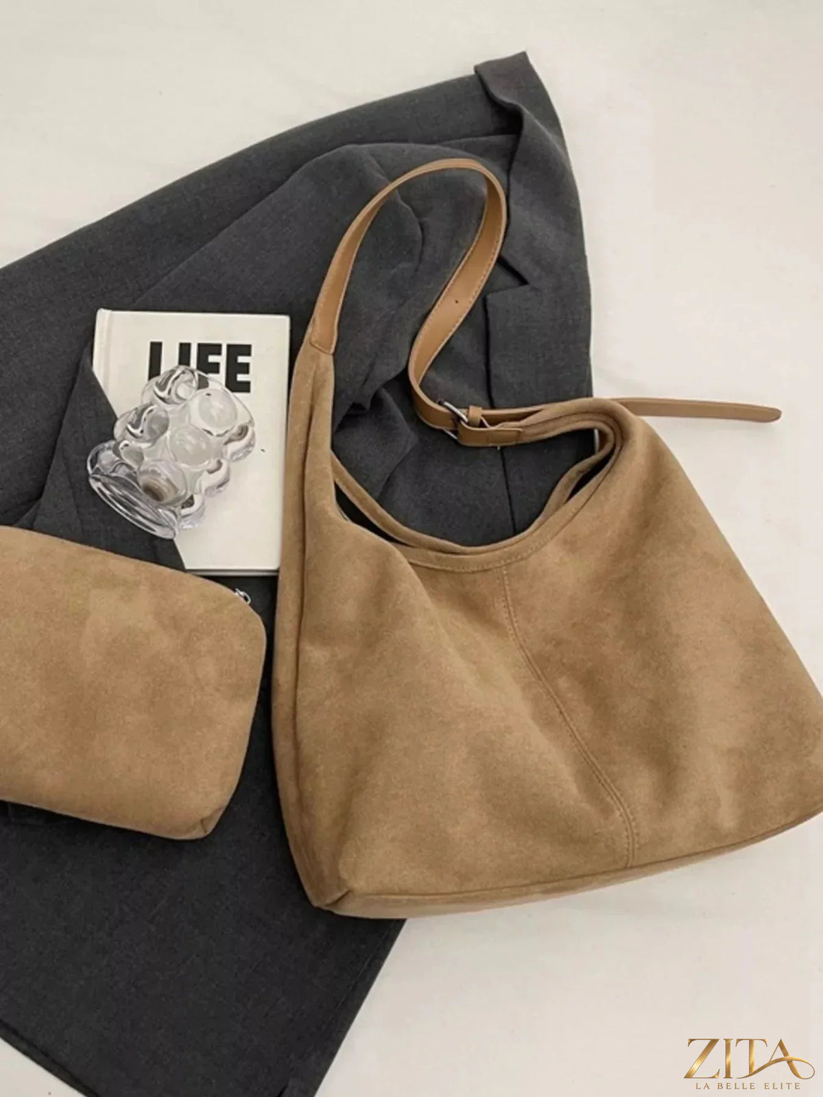 Zita La Belle Elite lightweight adjustable strap handbag with sleek design and versatile style, shown in black leather.