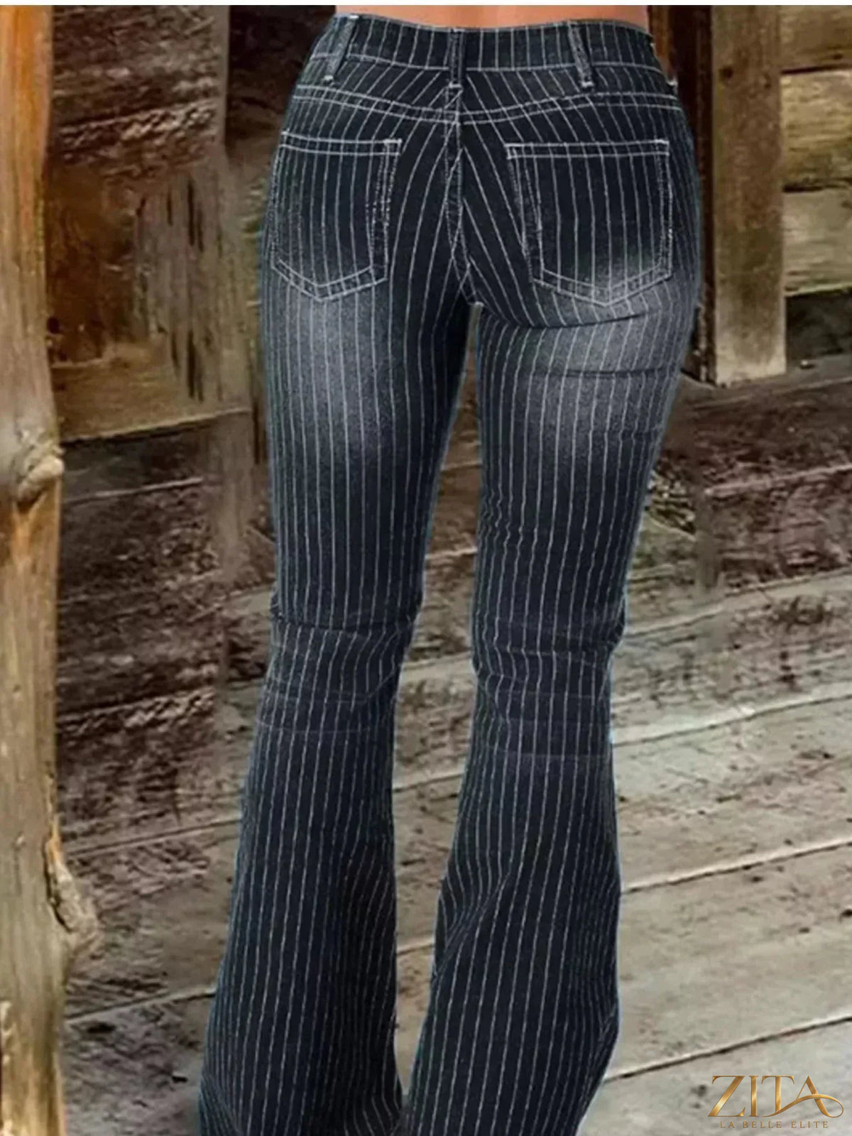 Zita La Belle Elite striped button fly flare jeans with high waist and wide leg, featuring bold vertical stripes and classic denim texture.