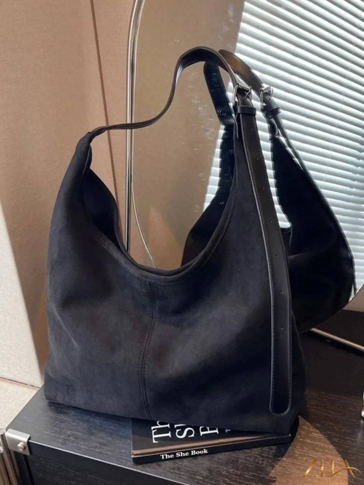 Lightweight Zita La Belle Elite adjustable strap handbag with sleek design and durable material, featuring a top handle and versatile style.