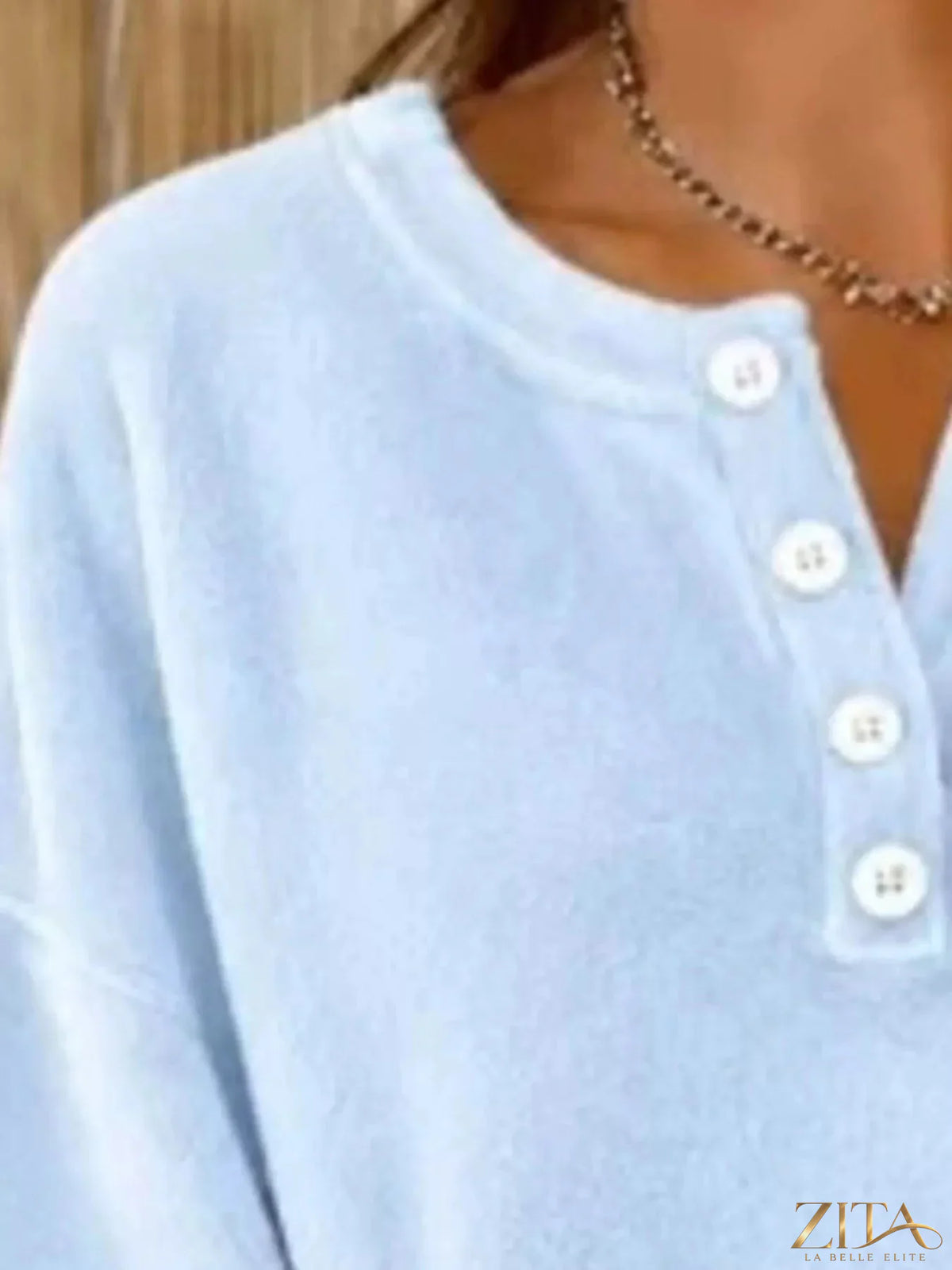 Zita La Belle Elite button detail dropped shoulder sweatshirt in soft fabric with decorative buttons and relaxed fit.
