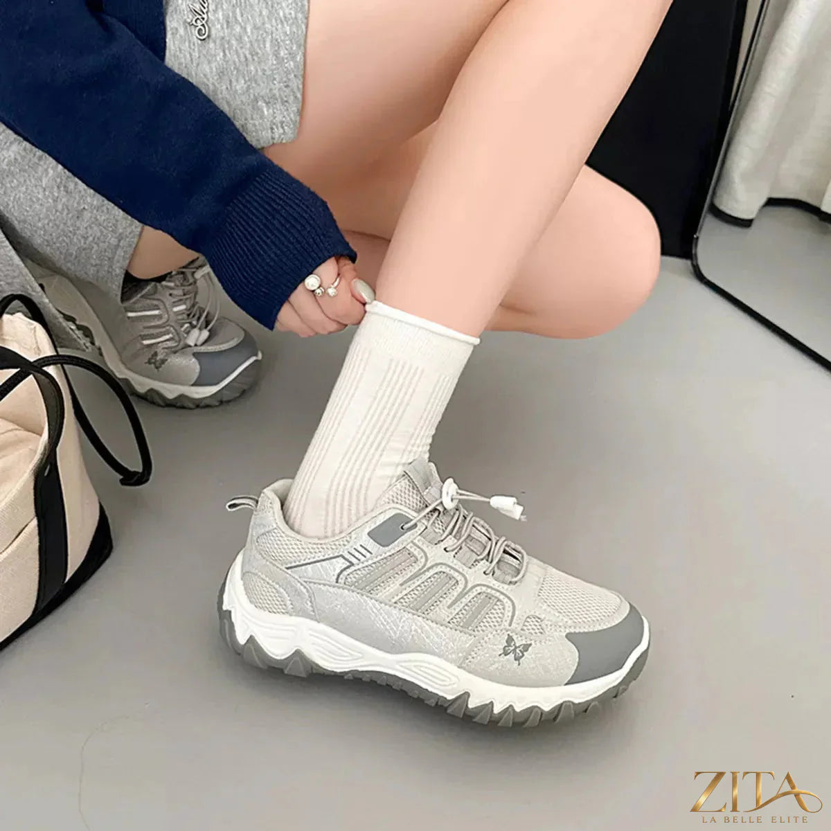 Zita La Belle Elite round toe lace-up sneakers in white with rubber sole and stylish design, perfect for casual wear.