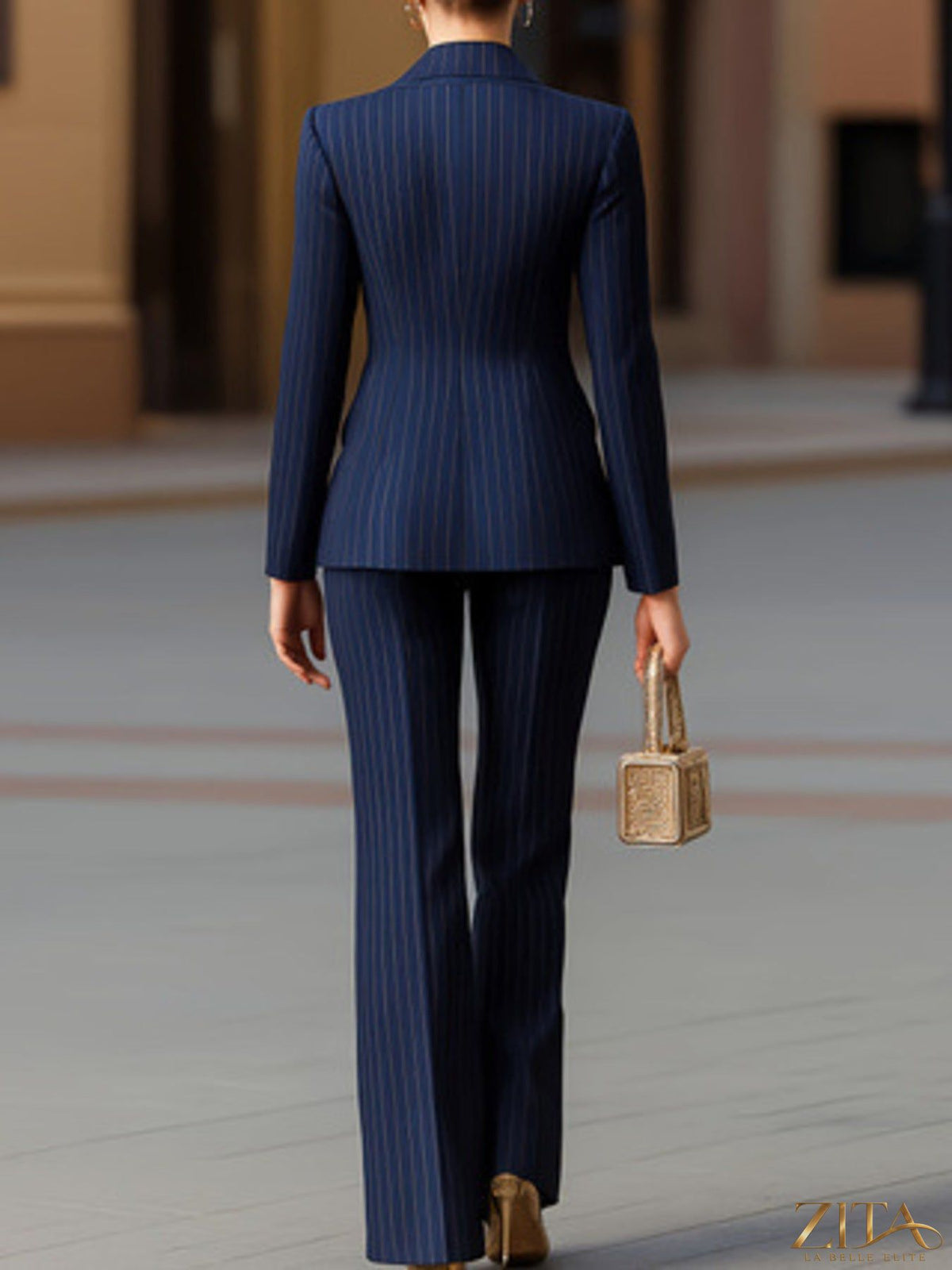 Zita La Belle Elite striped double-breasted blazer and wide-leg pants set, tailored fit with bold vertical stripes and classic lapel collar.