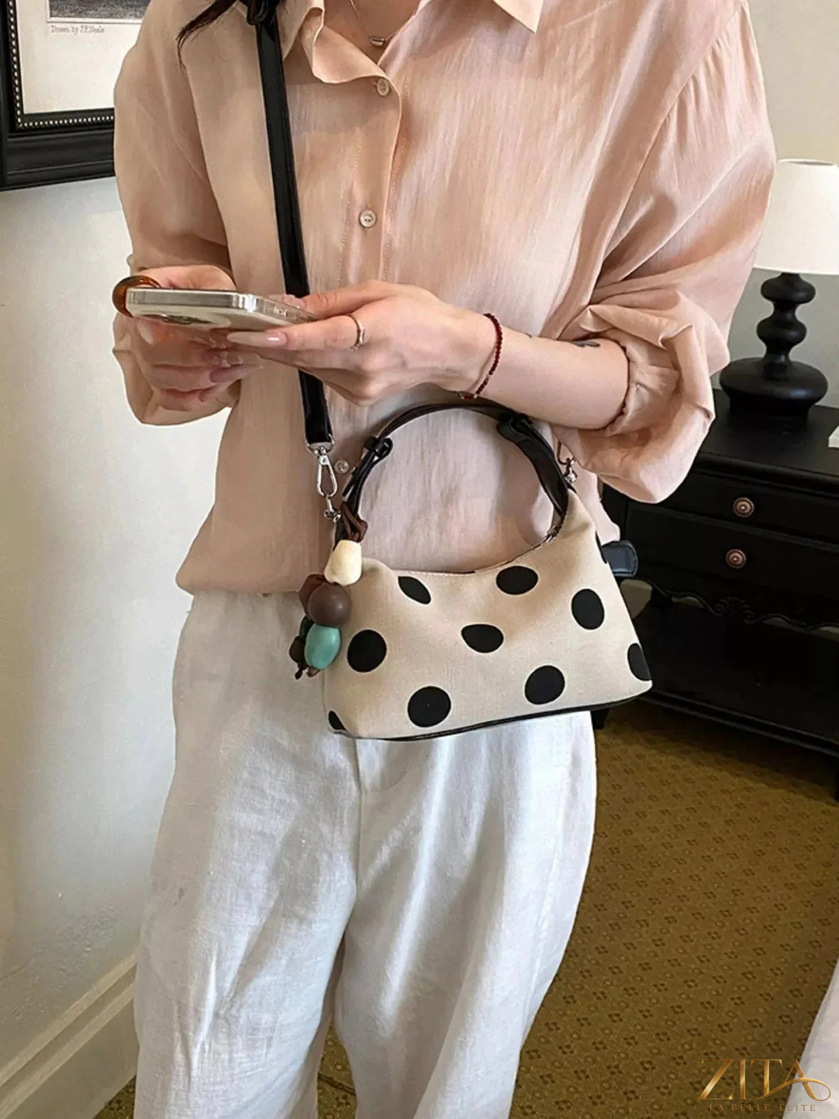 Polka dot PU leather handbag by Zita La Belle Elite featuring a stylish design and top handle for versatile fashion.