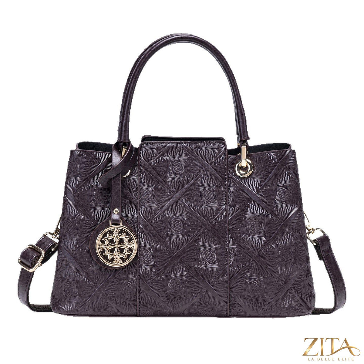 Zita La Belle Elite embossed pattern leather top handle handbag with textured design and structured shape.