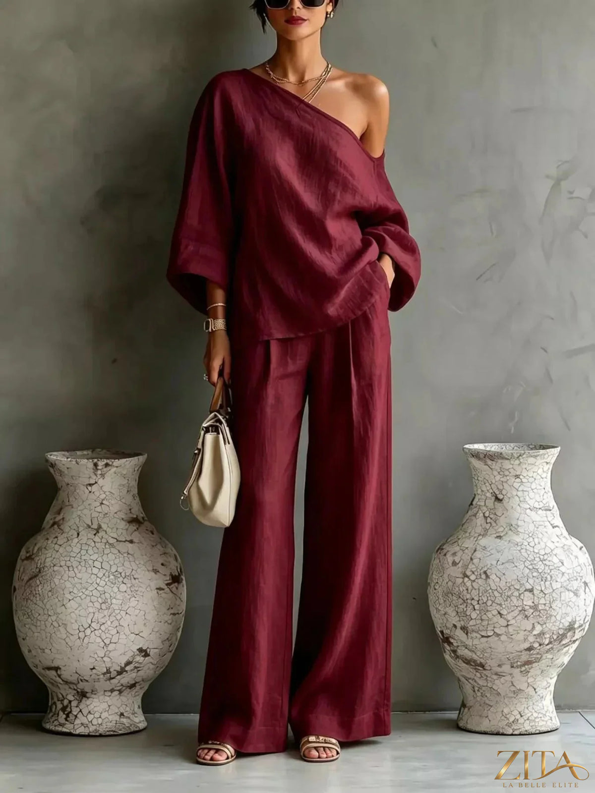 Zita La Belle Elite one shoulder top and wide leg pants set in stylish fabric, displayed on a mannequin.