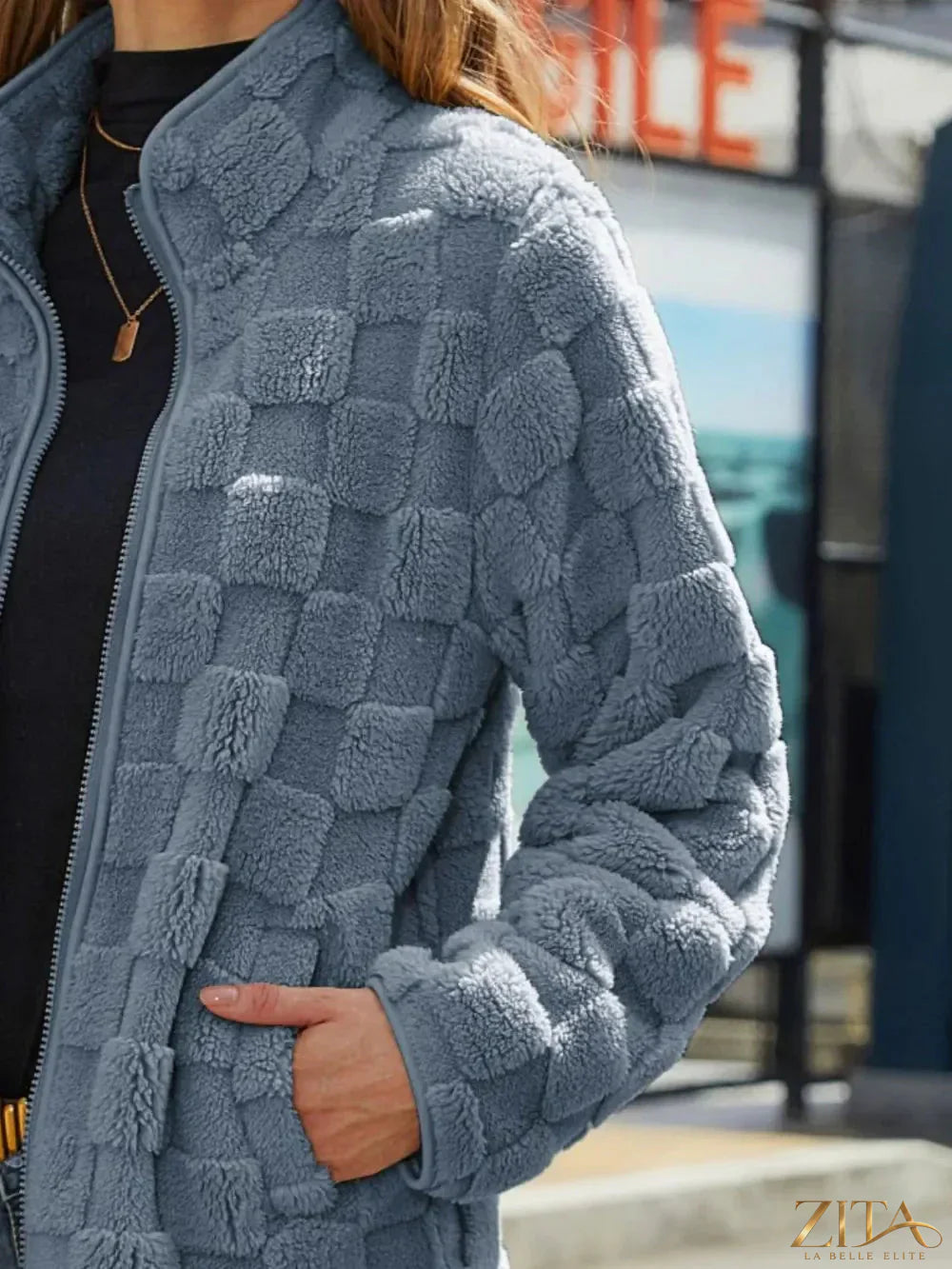 Zita La Belle Elite fuzzy checkered zip-up jacket with a cozy, stylish design and front zipper, ideal for casual wear.