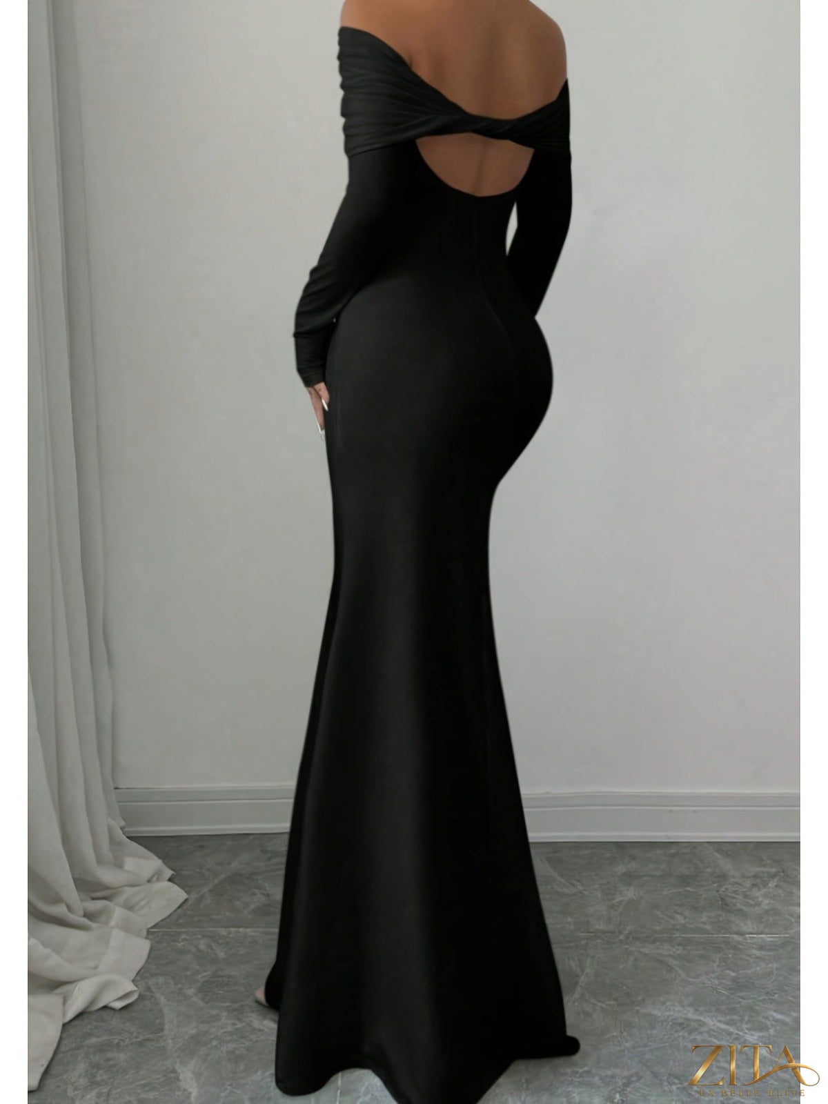 Elegant off-shoulder midi evening gown by Zita La Belle Elite, featuring flowing fabric and sophisticated design for women.