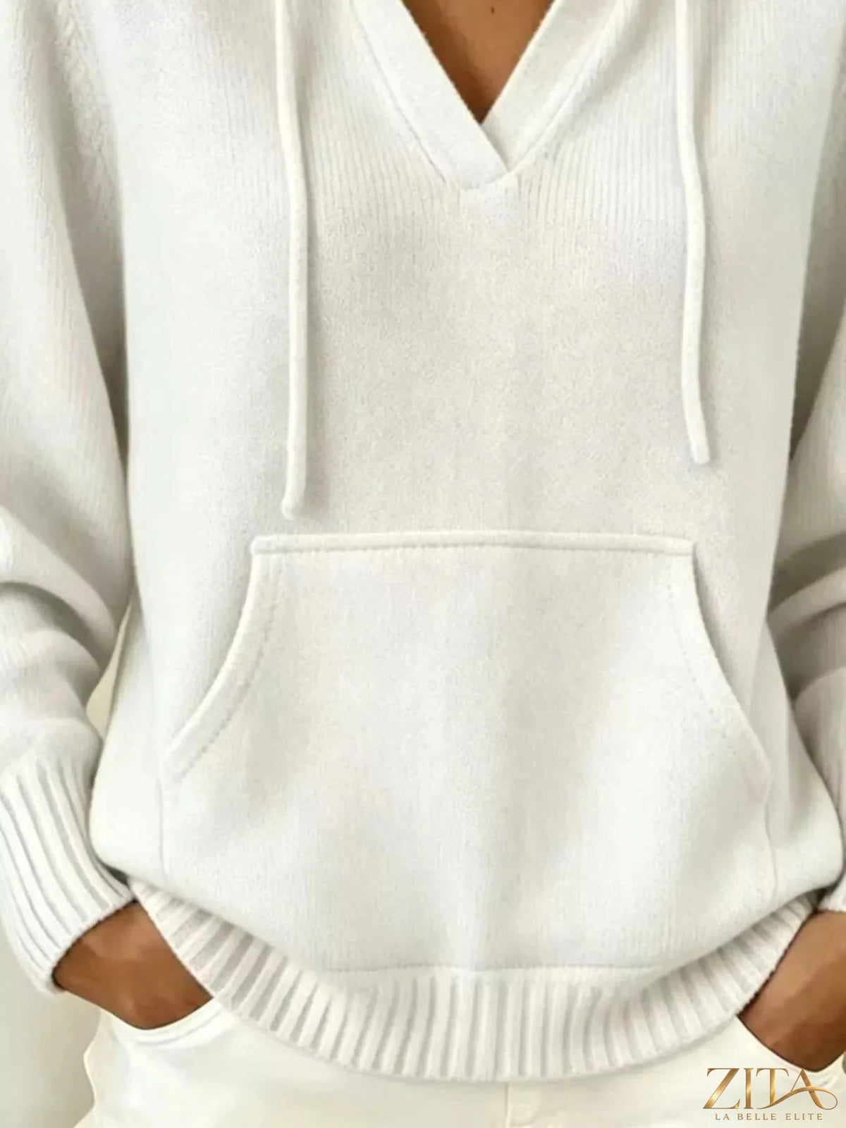 Gray kangaroo pocket hooded sweater by Trendsi, featuring a cozy hood, front kangaroo pocket, and casual fit.