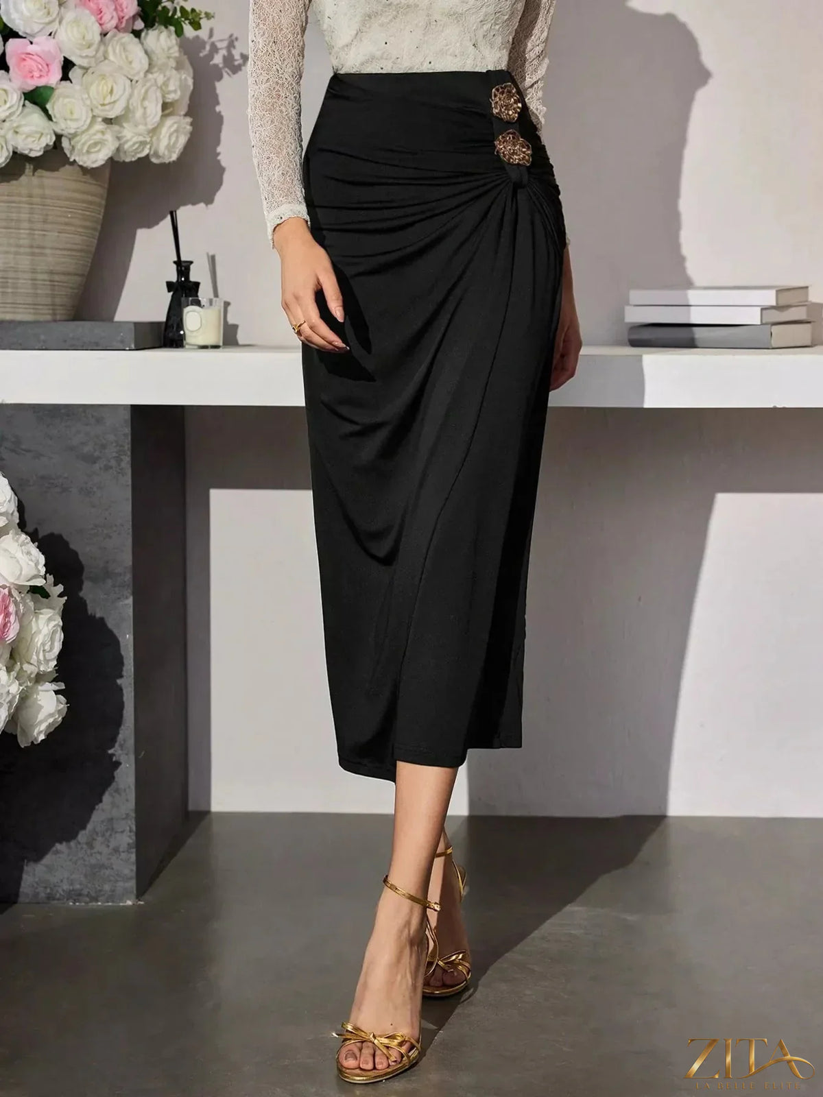 Elegant high-waisted ruched midi skirt with decorative buttons, stylish women's fashion from Trendsi, shown in a neutral setting.
