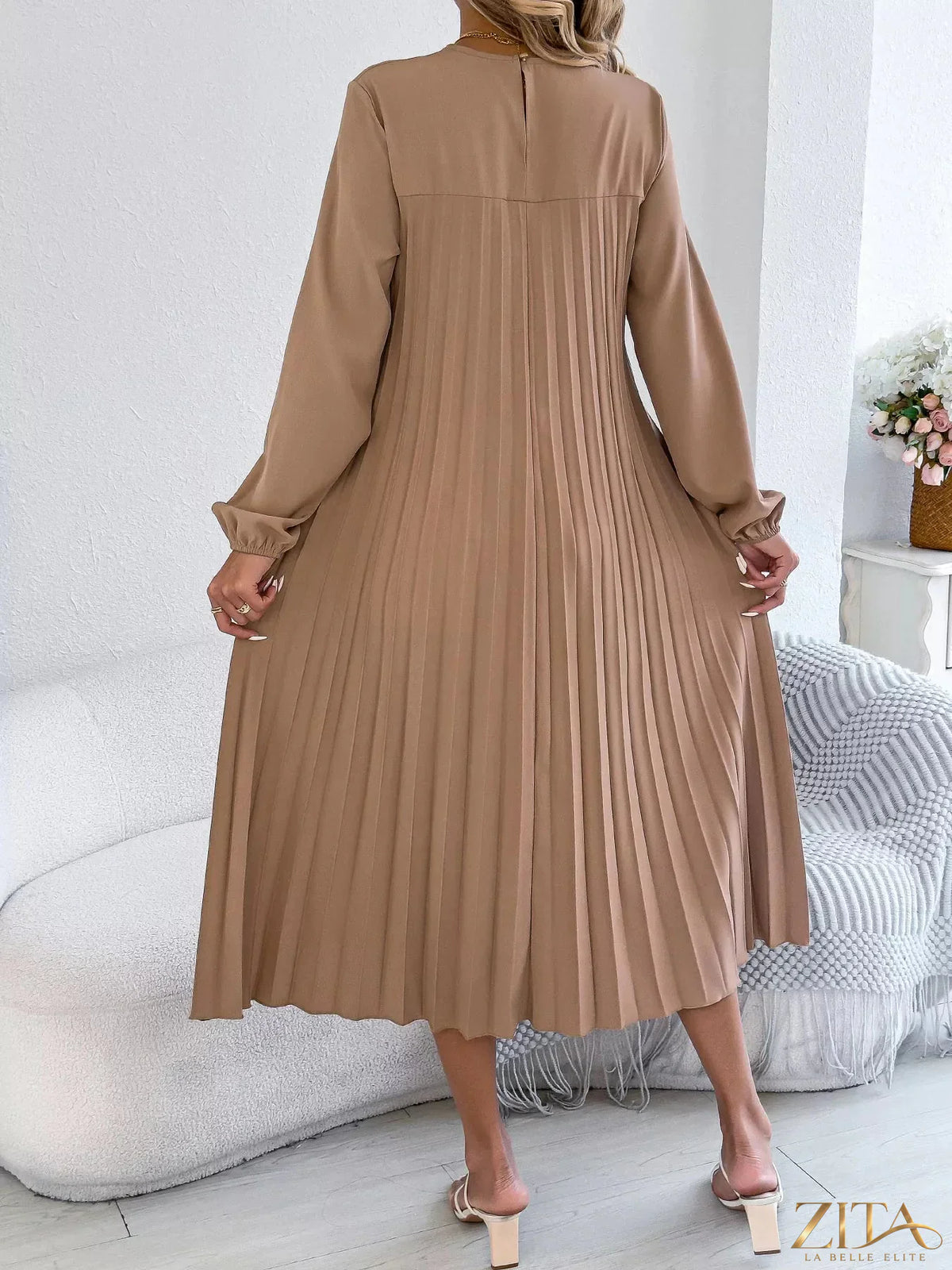 Zita La Belle Elite pleated A-line midi dress featuring a flowy silhouette and elegant design, perfect for stylish occasions.
