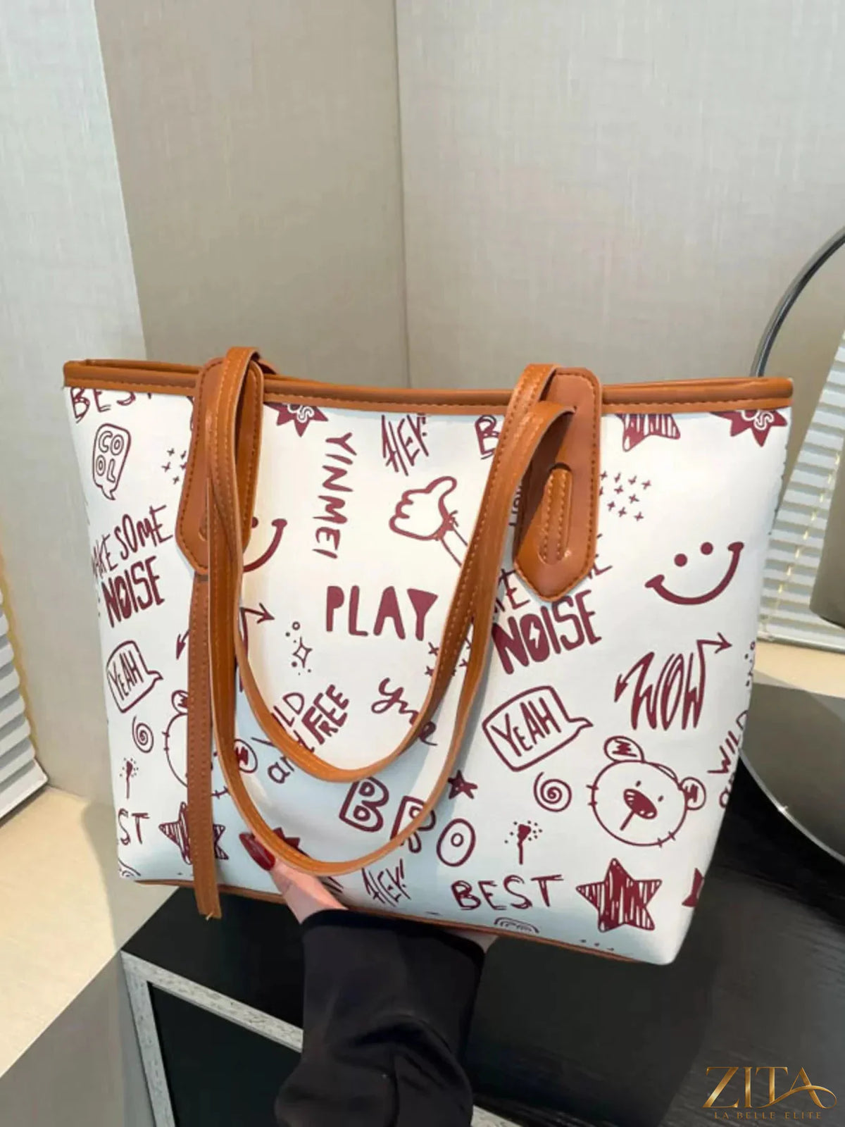 Zita La Belle Elite graffiti print casual tote bag with colorful urban graffiti design and sturdy handles.