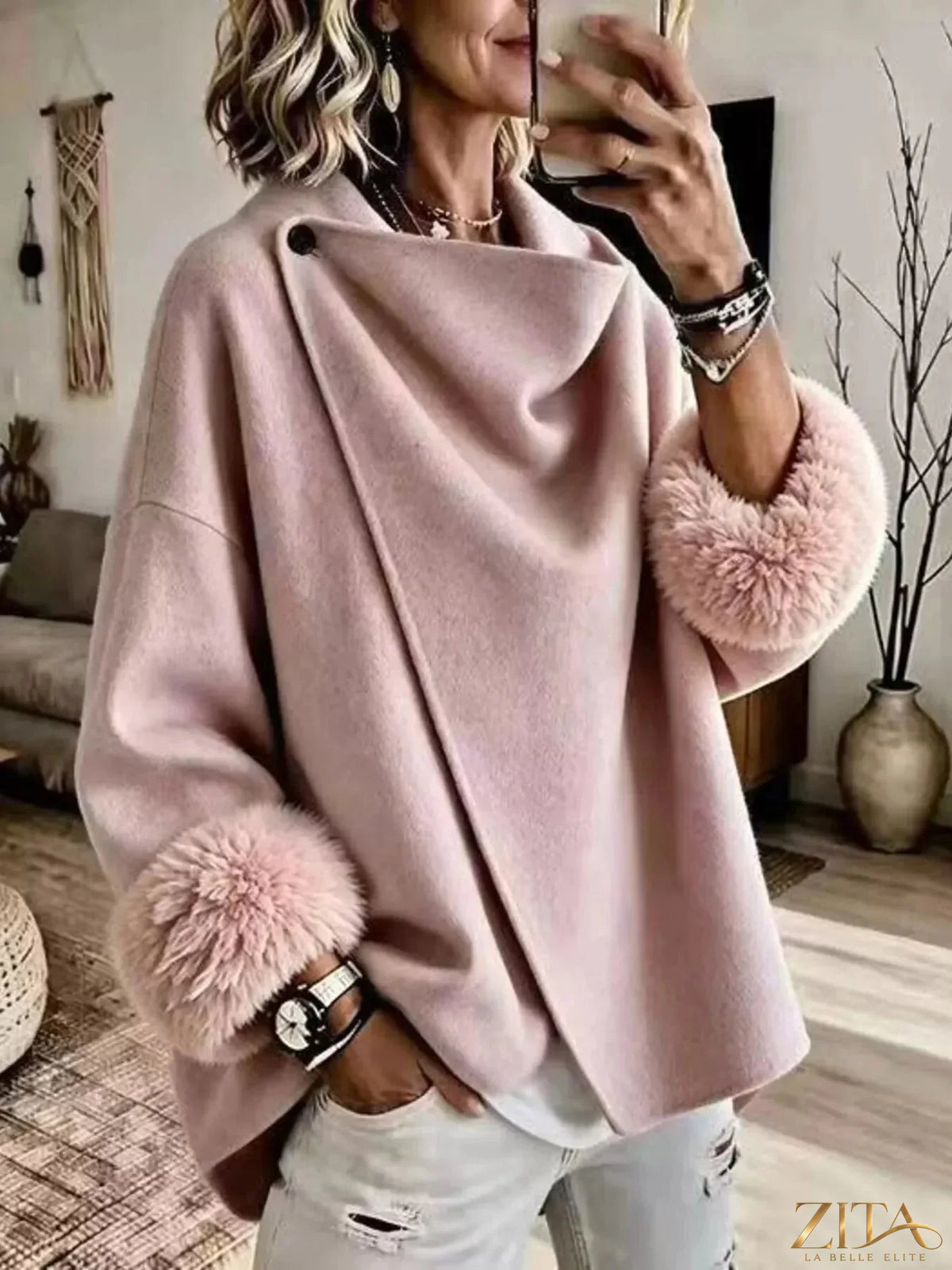 Plus size full-length outerwear by Zita La Belle Elite featuring an elegant asymmetric faux fur cuff and stylish design.