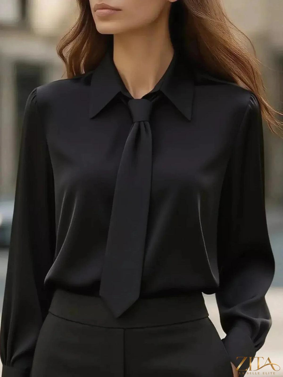 Zita La Belle Elite tie-neck long sleeve blouse with elegant design, featuring a stylish collar and fitted cuffs.