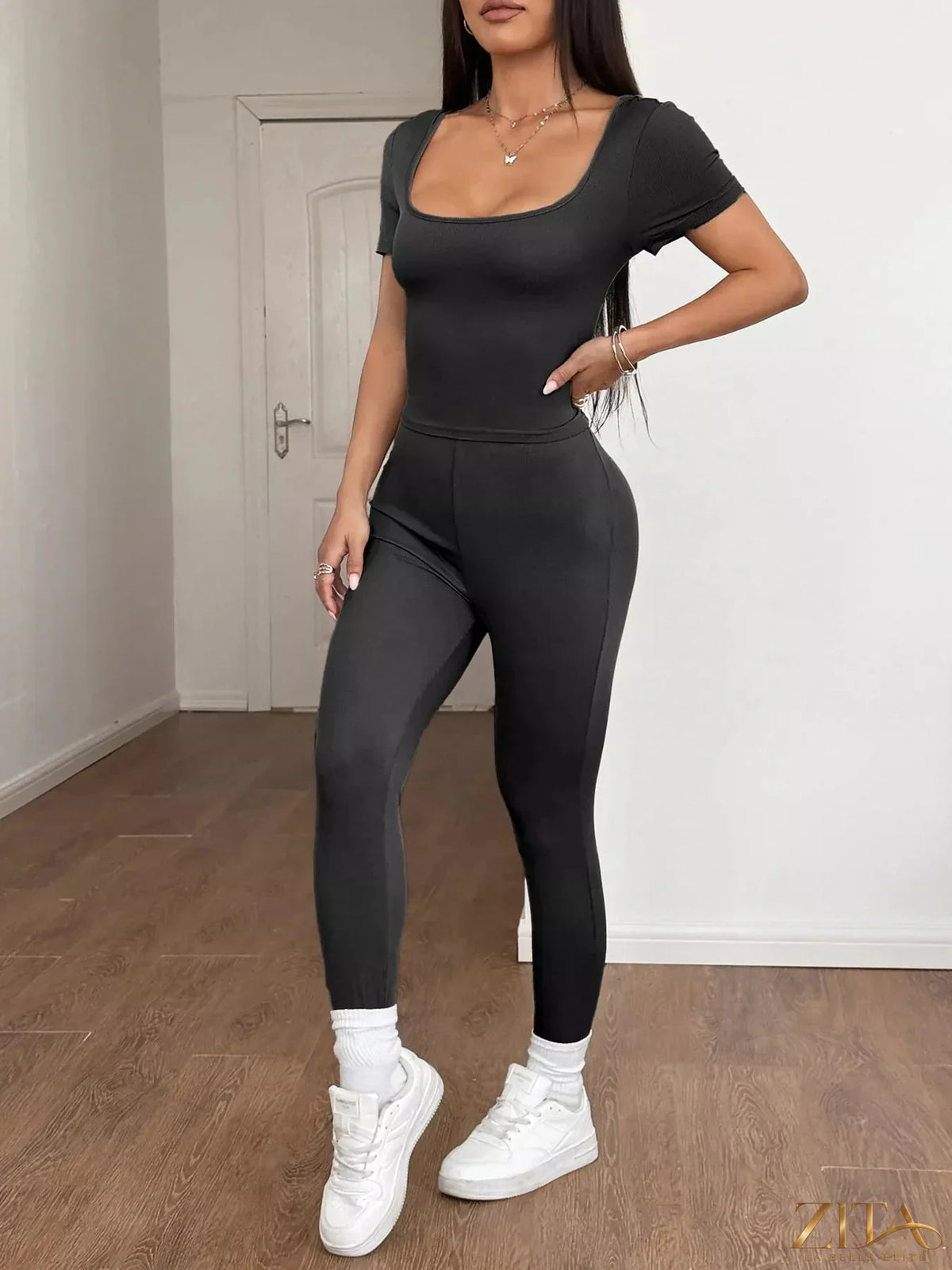 Trendsi short sleeve top and matching leggings set, stylish casual outfit for women, featuring a comfortable fit and modern design.