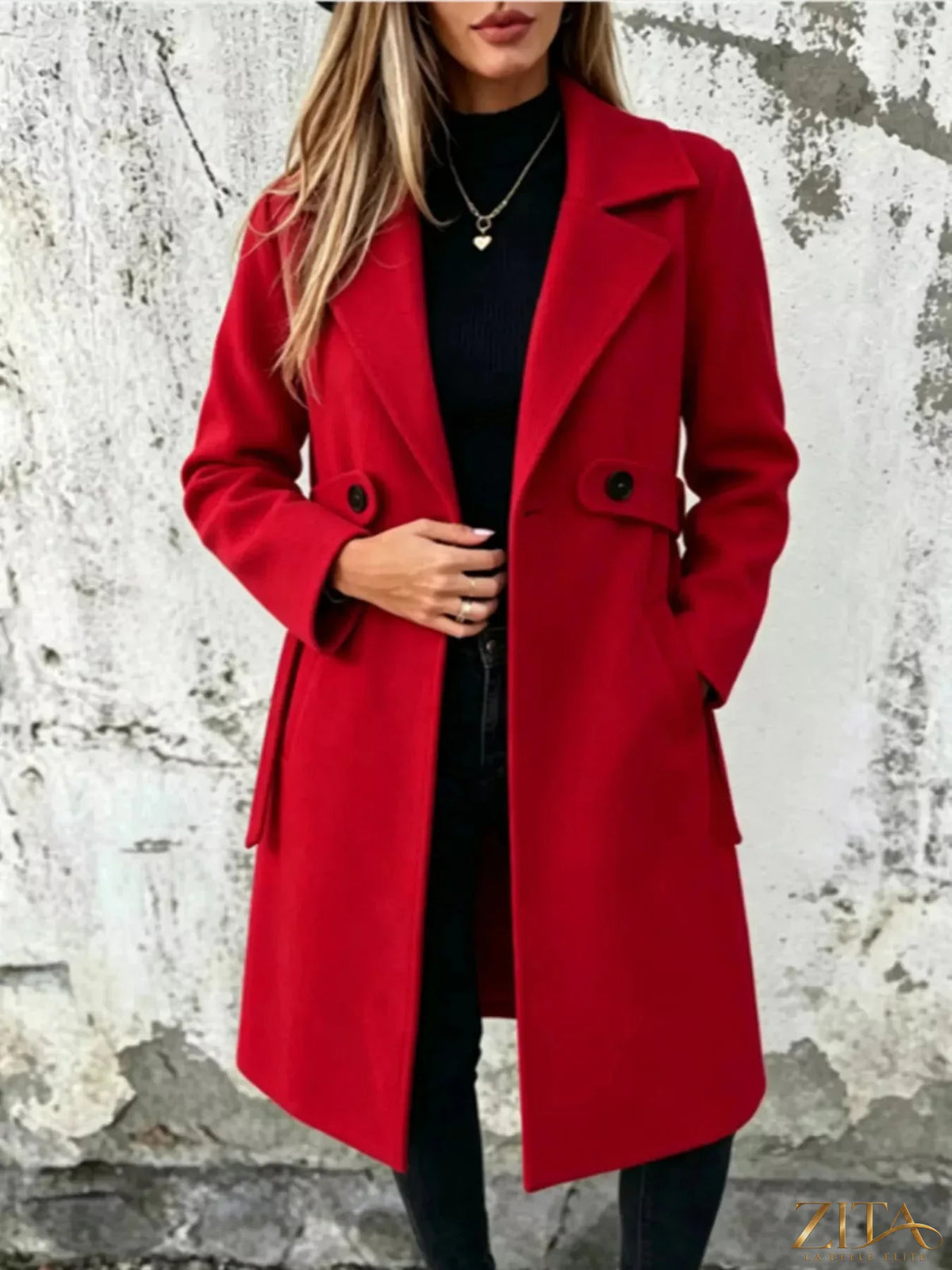 Plus size Zita La Belle Elite full size lapel collar longline overcoat hanging on a rack with a neutral background.