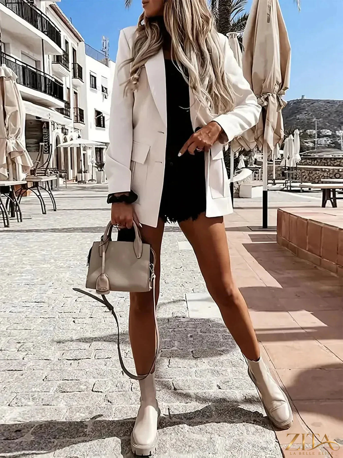 Zita La Belle Elite lapel collar long sleeve blazer in dark fabric, featuring a tailored fit and classic design.