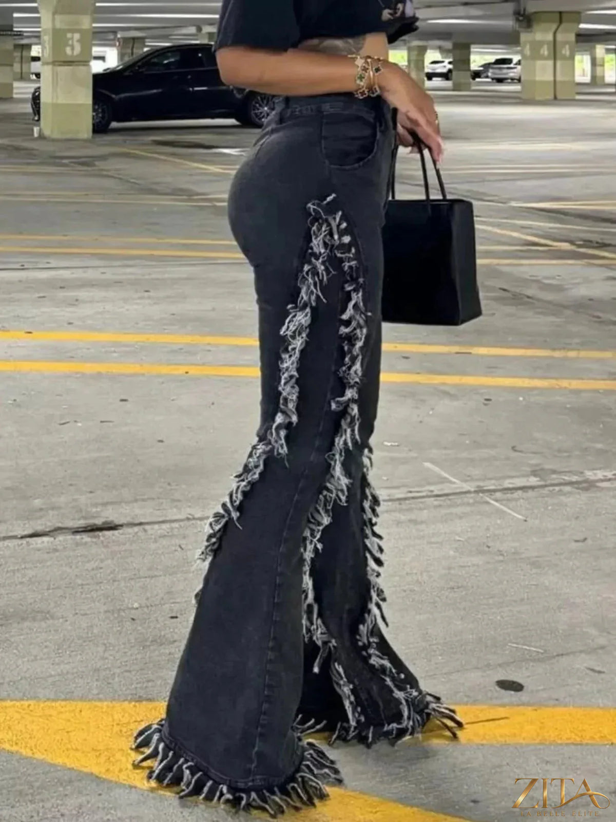 Zita La Belle Elite frayed trim high waist flare jeans with a stylish vintage look, showcasing the distressed hem and fitted waist.