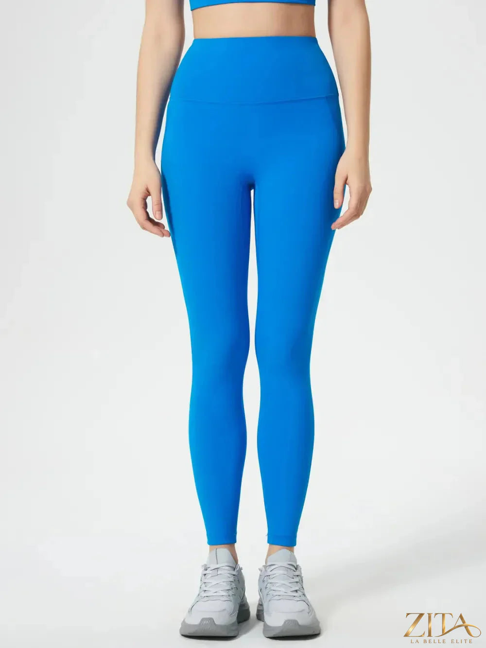 Trendsi Millennia wide waistband active leggings in black, showing stretch fabric and comfortable fit on model.