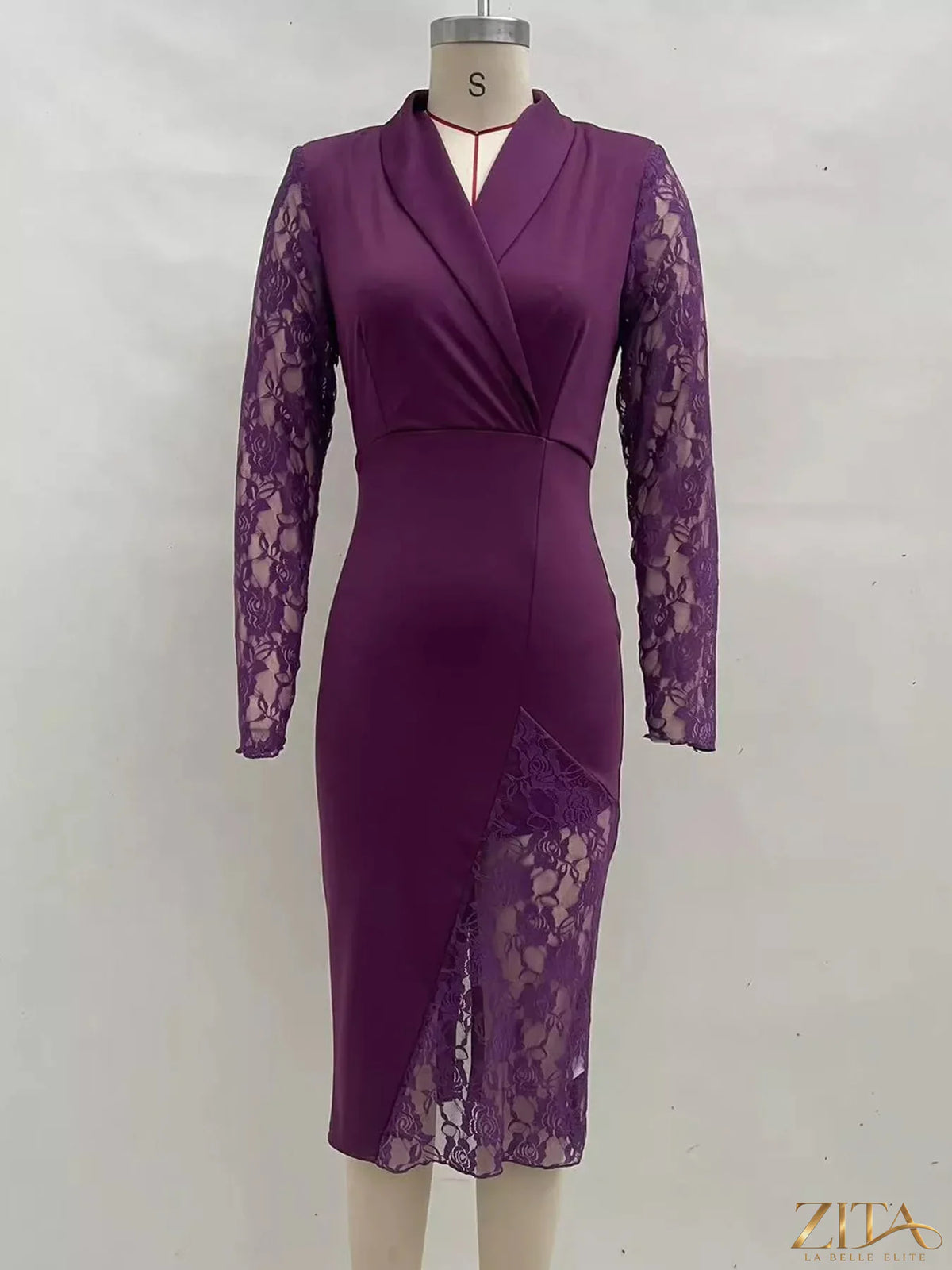 Zita La Belle Elite lace-sleeve blazer dress displayed on a hanger featuring elegant lace details and tailored fit.
