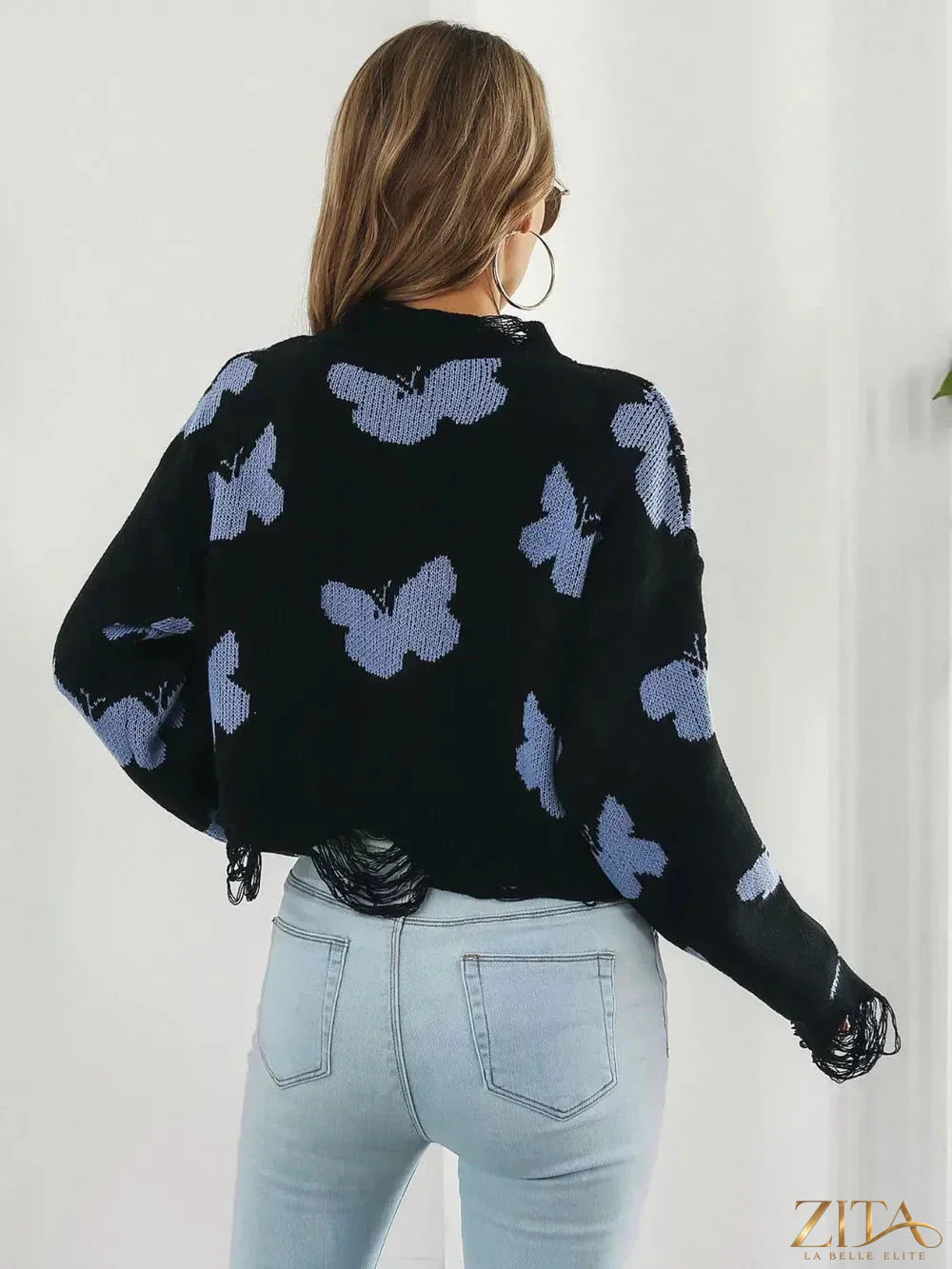 Zita La Belle Elite distressed butterfly cropped sweater in soft knit with ripped details and long sleeves, stylish and trendy.