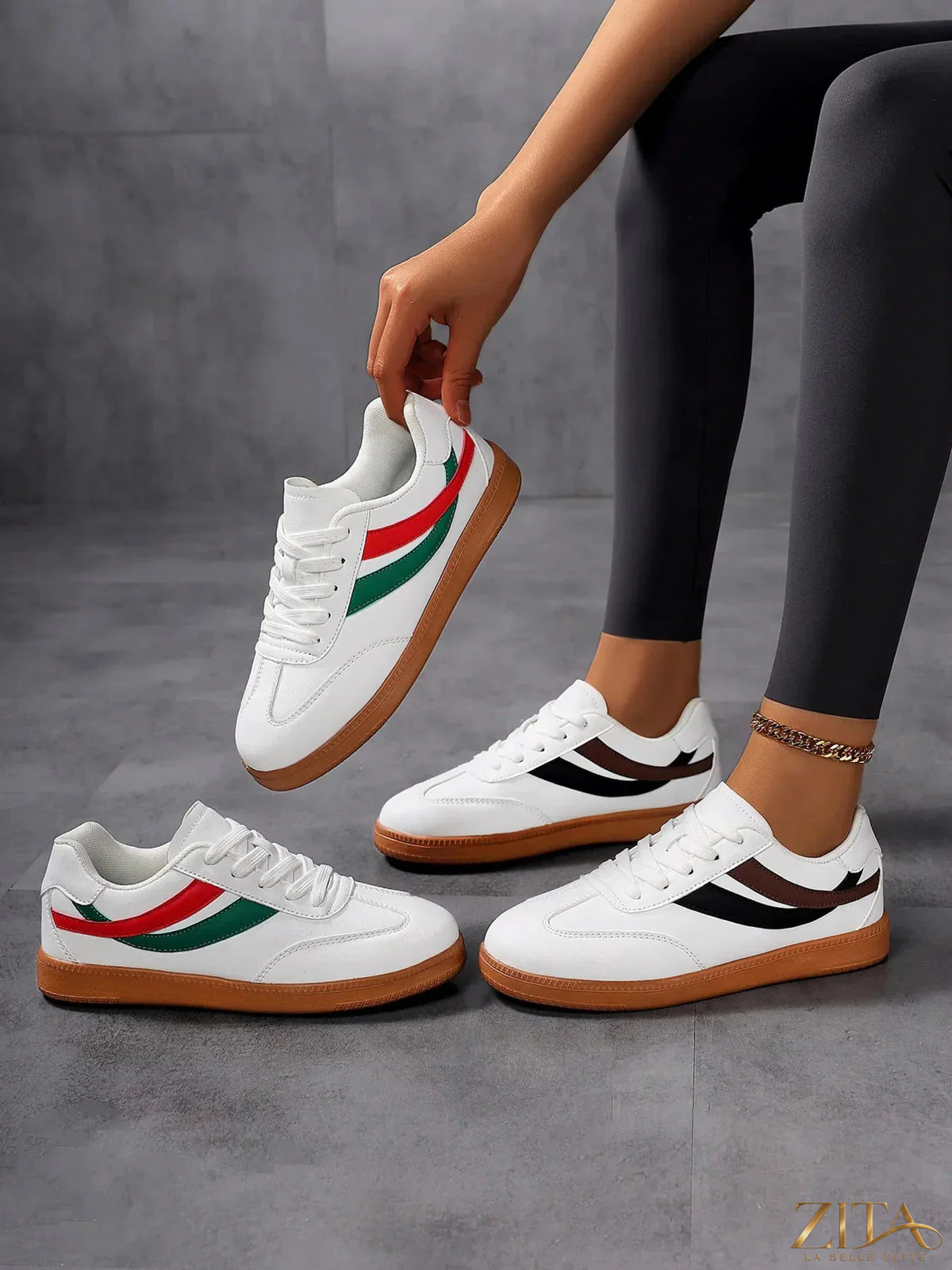 Zita La Belle Elite lace-up flat sneakers with white stripe accent and casual design, showing the stylish upper and sole detail.