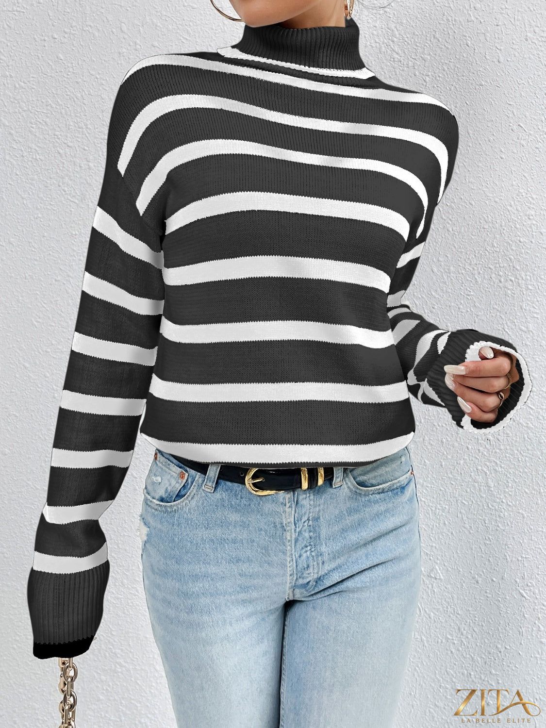 Striped turtleneck drop shoulder sweater by Trendsi, featuring bold horizontal stripes and cozy knit fabric for a stylish winter look.