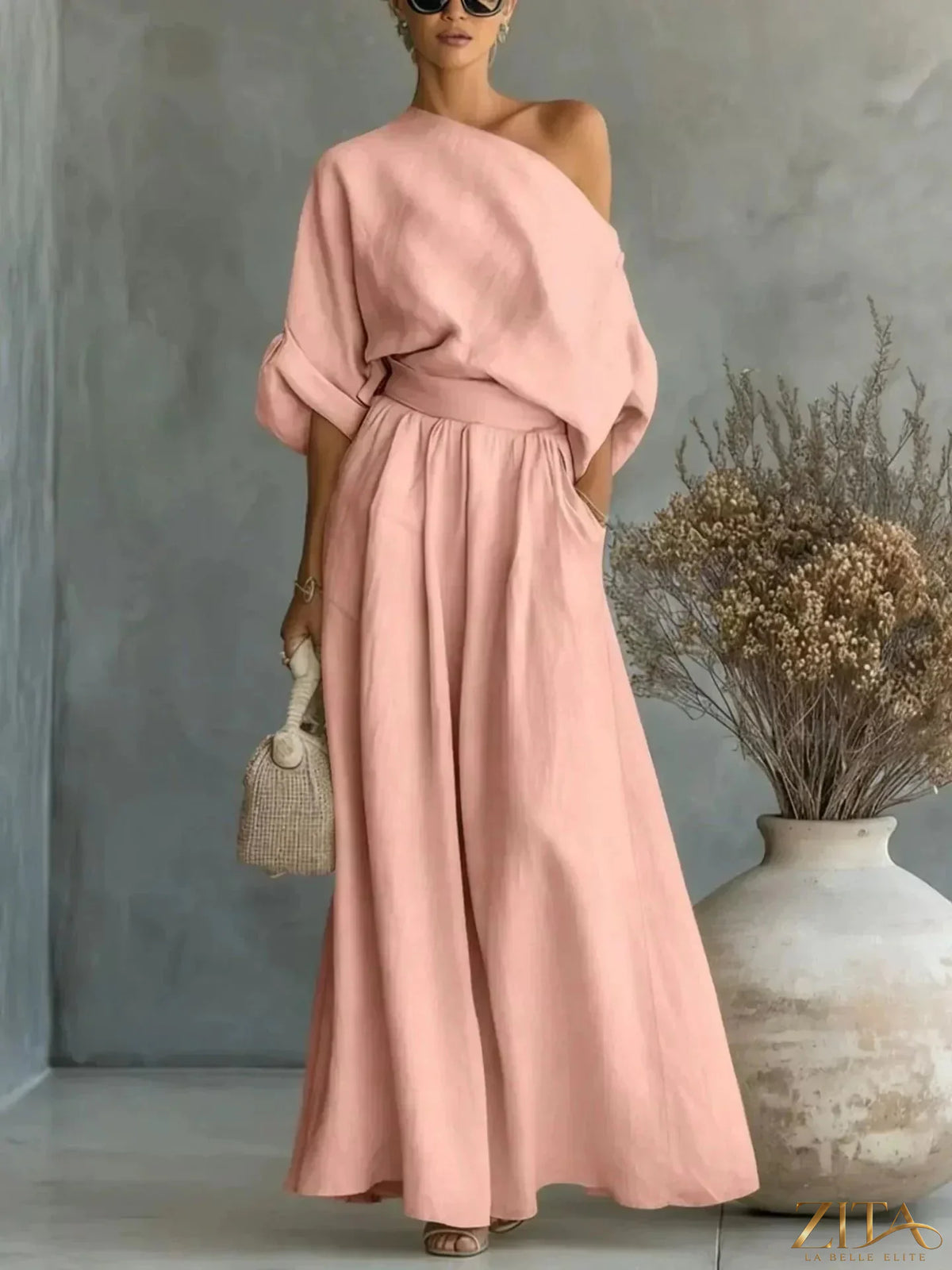 Plus size Zita La Belle Elite full size one-shoulder top and wide-leg pants set, shown in a stylish, coordinated outfit.