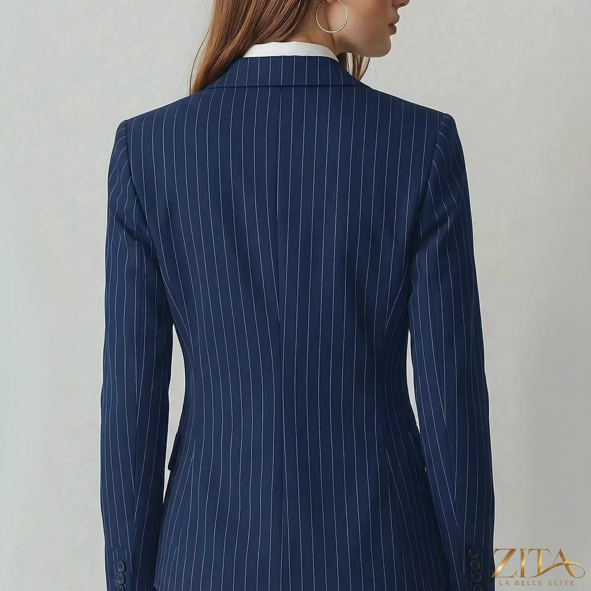 Navy striped waist-cinching petite blazer by Zita La Belle Elite, showing the tailored fit and stylish design on a model.