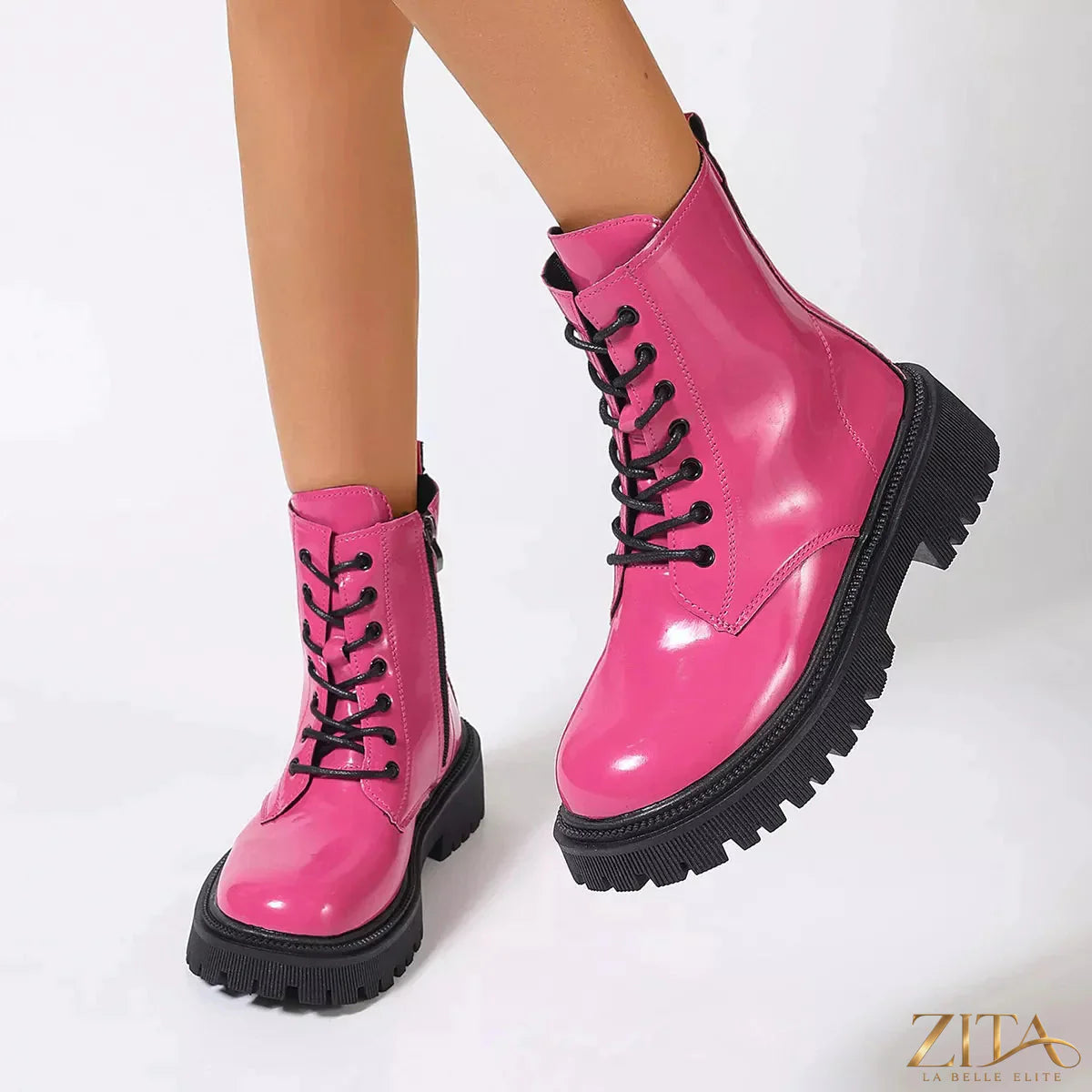 Zita La Belle Elite lace-up platform combat boots with chunky heels and rugged design, shown in black leather.
