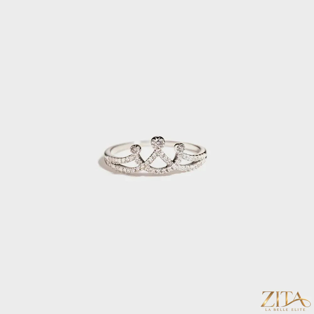 Sterling silver ring with a crown-shaped inlay featuring sparkling zircon stones, designed by Zita La Belle Elite.