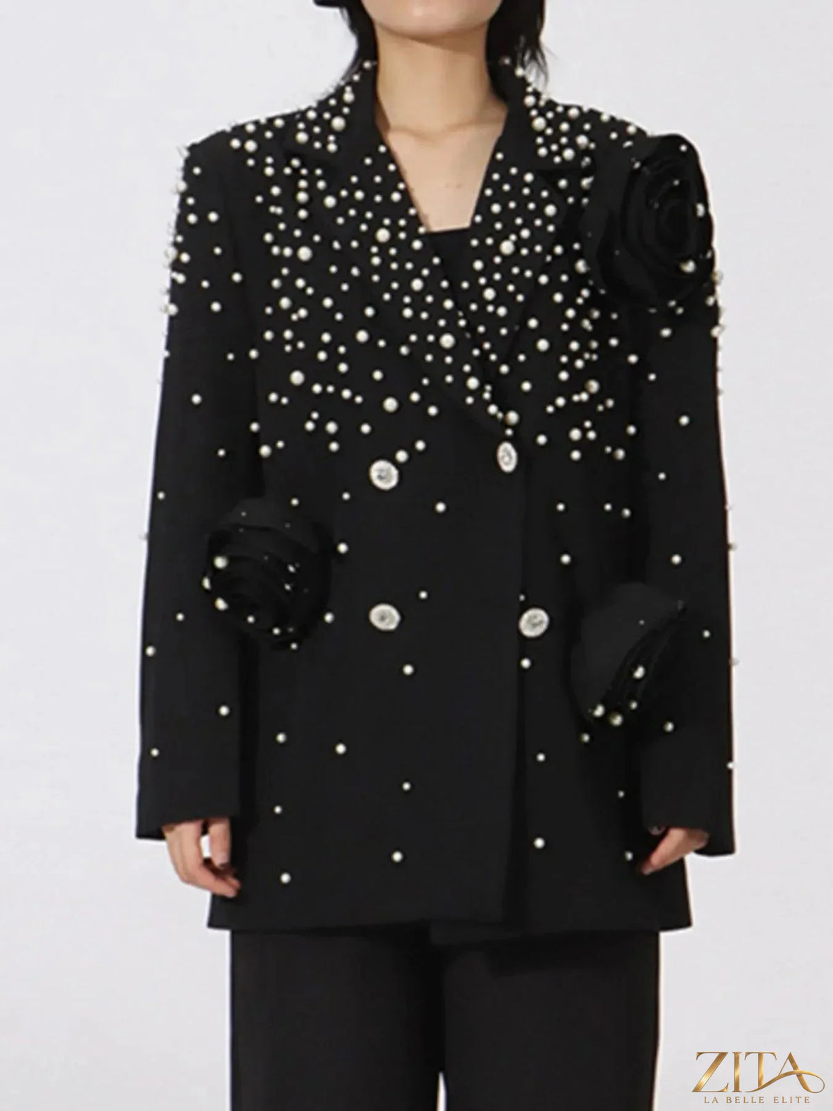 Pearl-embellished double-breasted blazer from Trendsi, featuring elegant pearl accents and tailored fit.