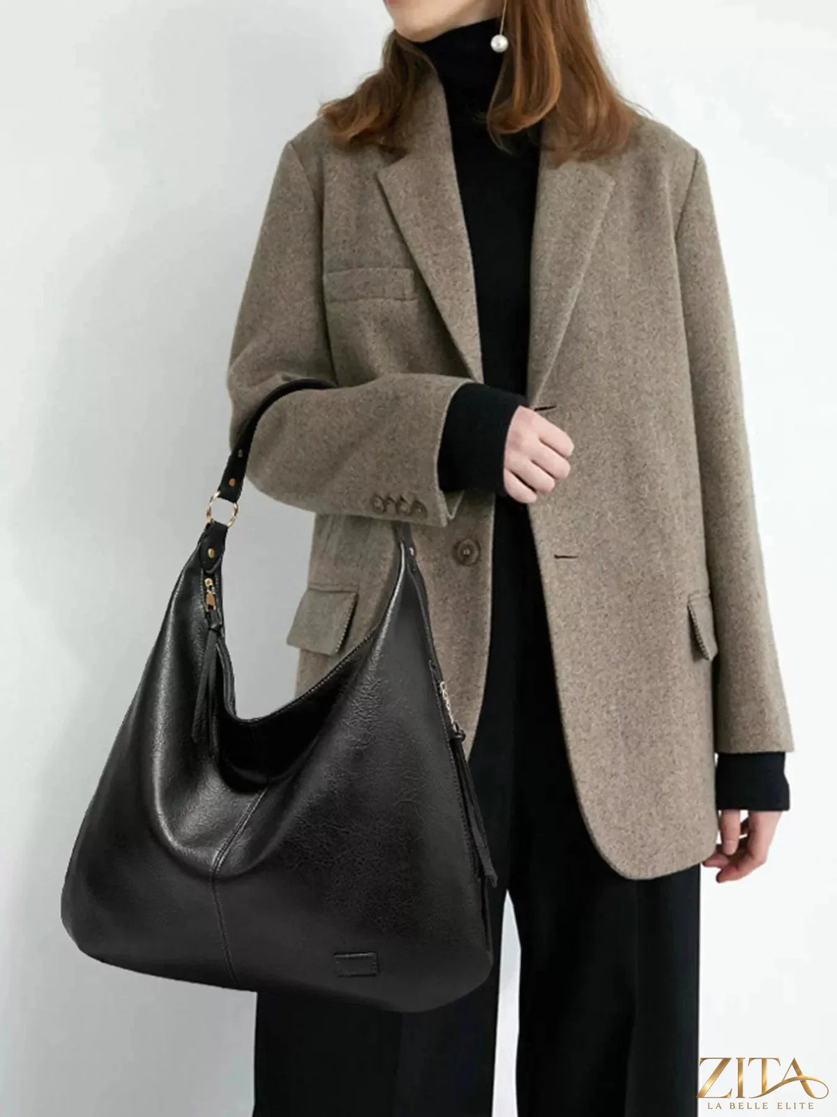 Leather slouchy shoulder bag by Zita La Belle Elite showing soft textured leather and spacious design with shoulder strap.