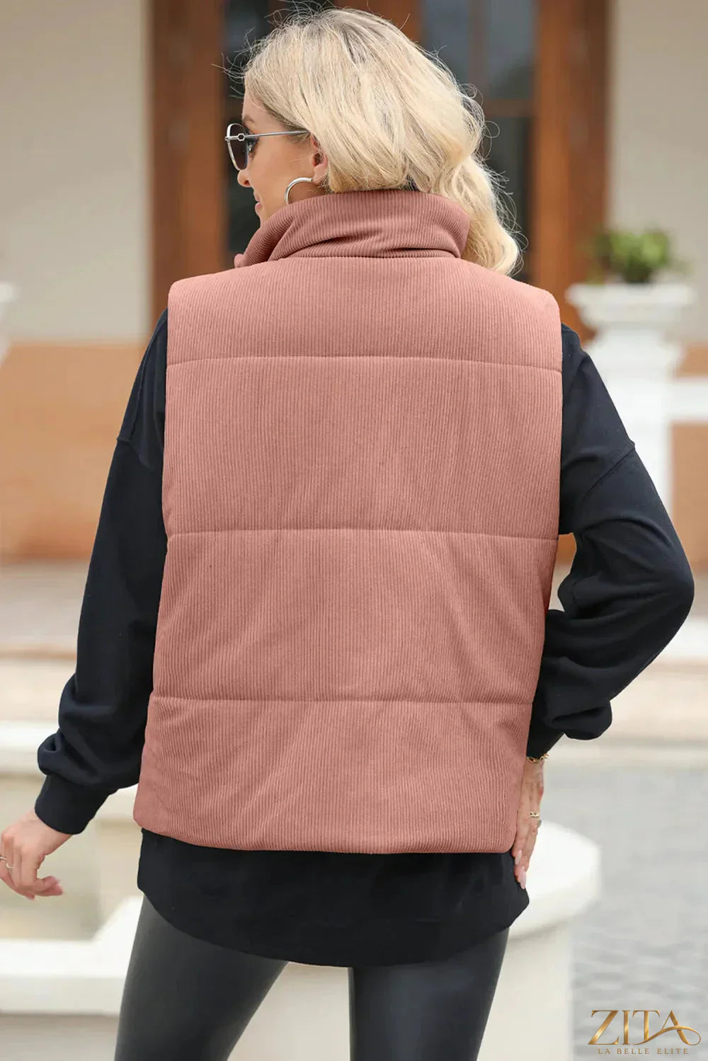 Trendsi pocketed zip-up turtleneck vest coat shown in black, featuring a high collar, front pockets, and a sleek zip closure.