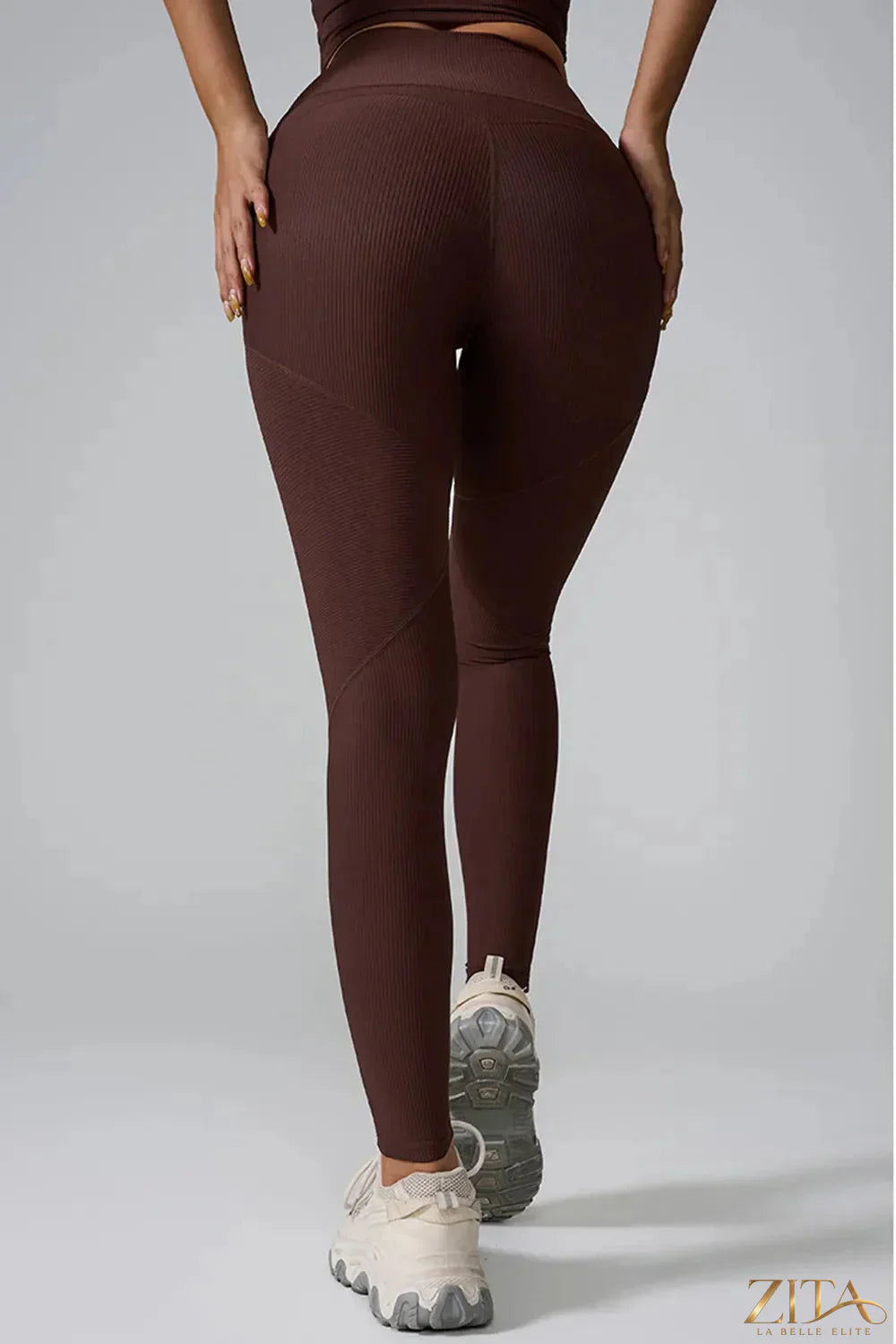 High waist active leggings by Trendsi, showcasing a sleek black design with stretchy, form-fitting fabric for workout or casual wear.