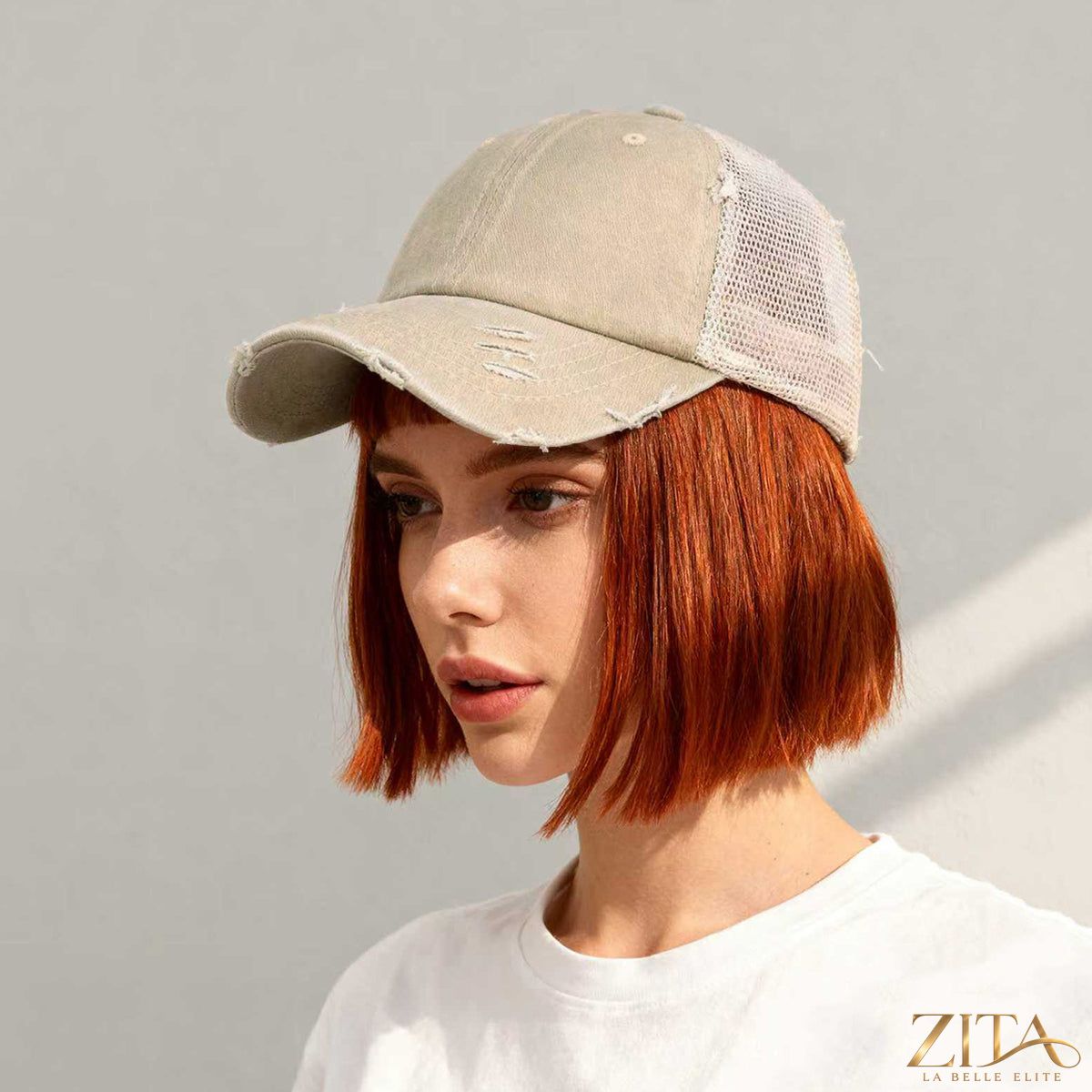 Distressed washed mesh baseball cap by Zita La Belle Elite, featuring a casual, vintage-style design with breathable mesh panels.