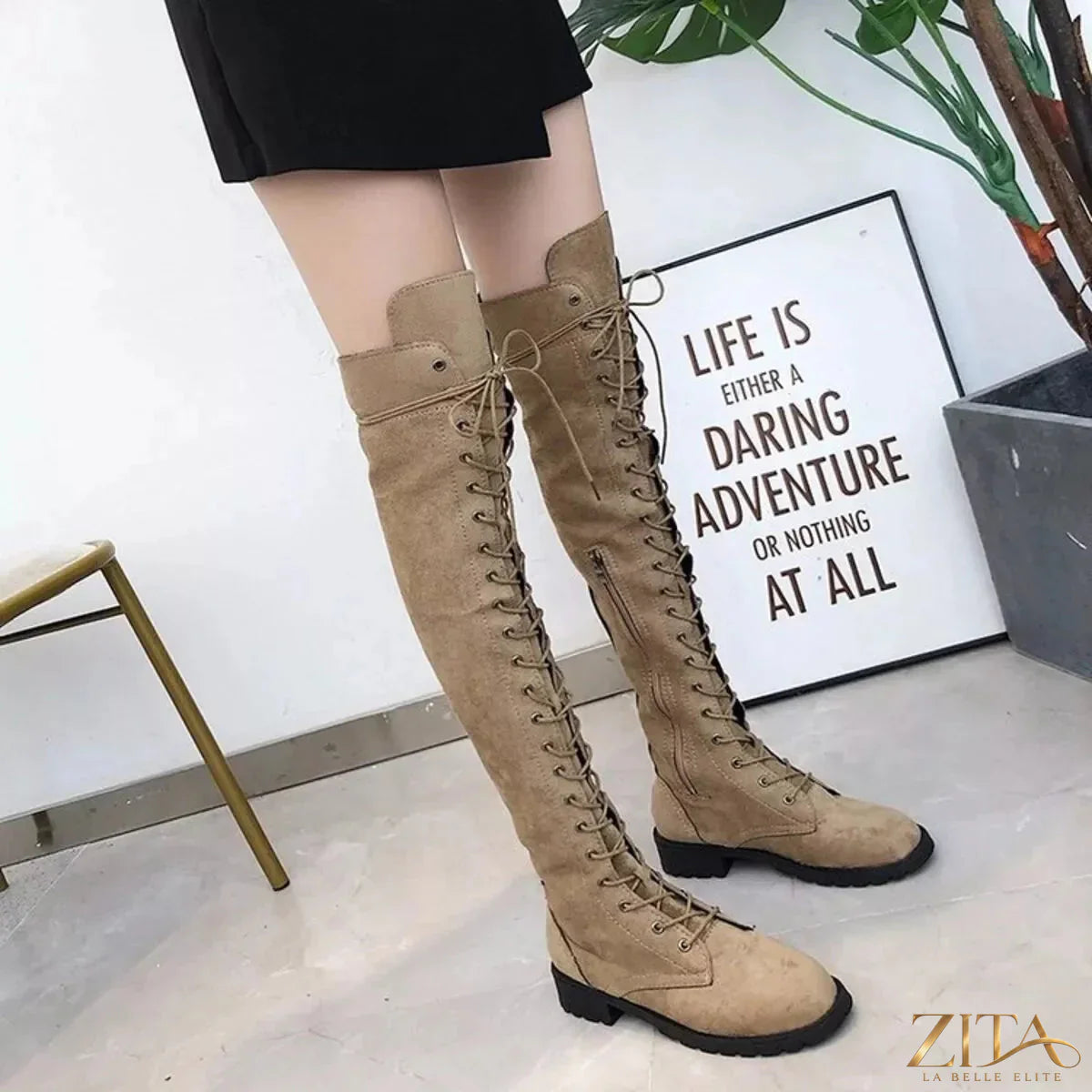 Black lace-up over-the-knee boots by Trendsi with chunky heels and sleek design, perfect for stylish winter outfits.