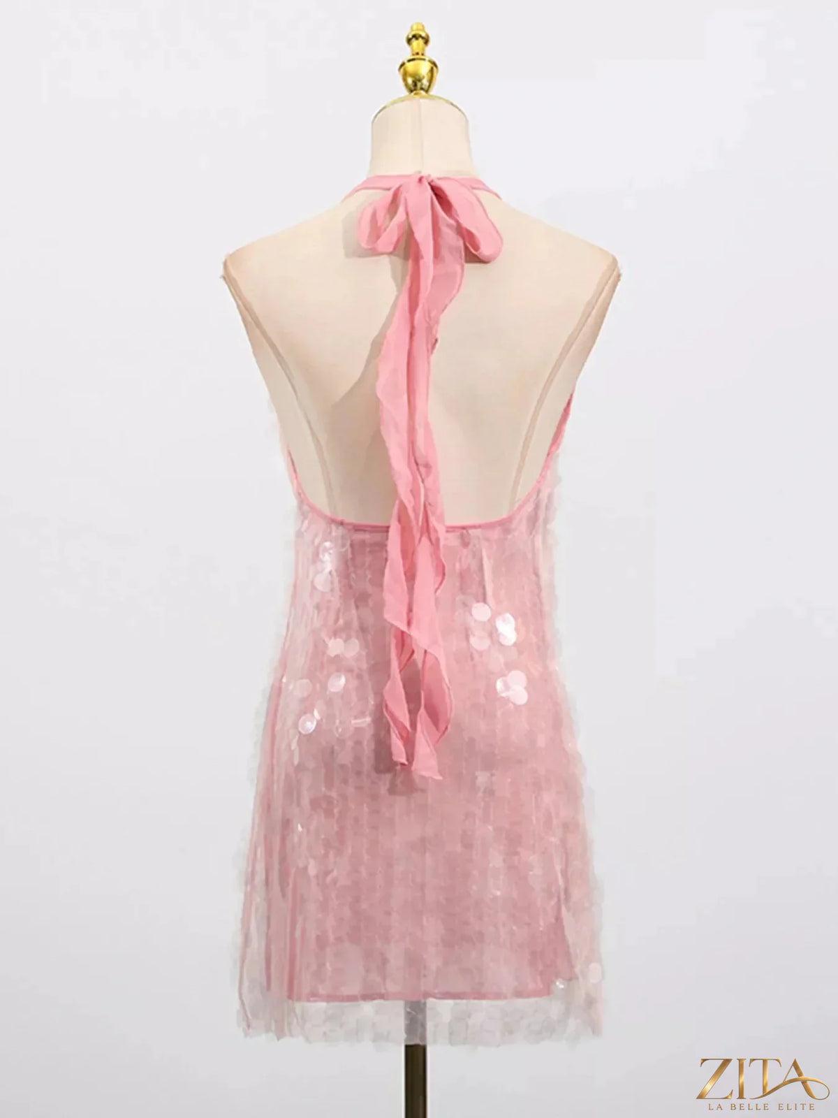 Zita La Belle Elite sequin halter neck mini dress with sparkle, sleeveless design, and fitted silhouette for evening wear.