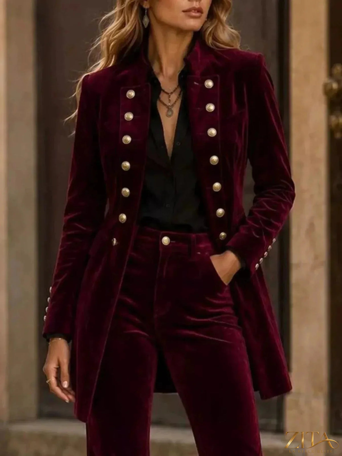 Velvet double-breasted blazer and flare pants set by Zita La Belle Elite, featuring a stylish, tailored fit in deep velvet fabric.