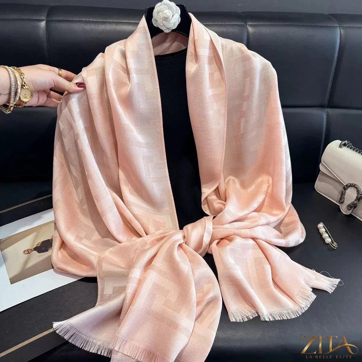 Raw hem scarf from Trendsi featuring soft fabric with unfinished edges, styled loosely draped on a neutral background.