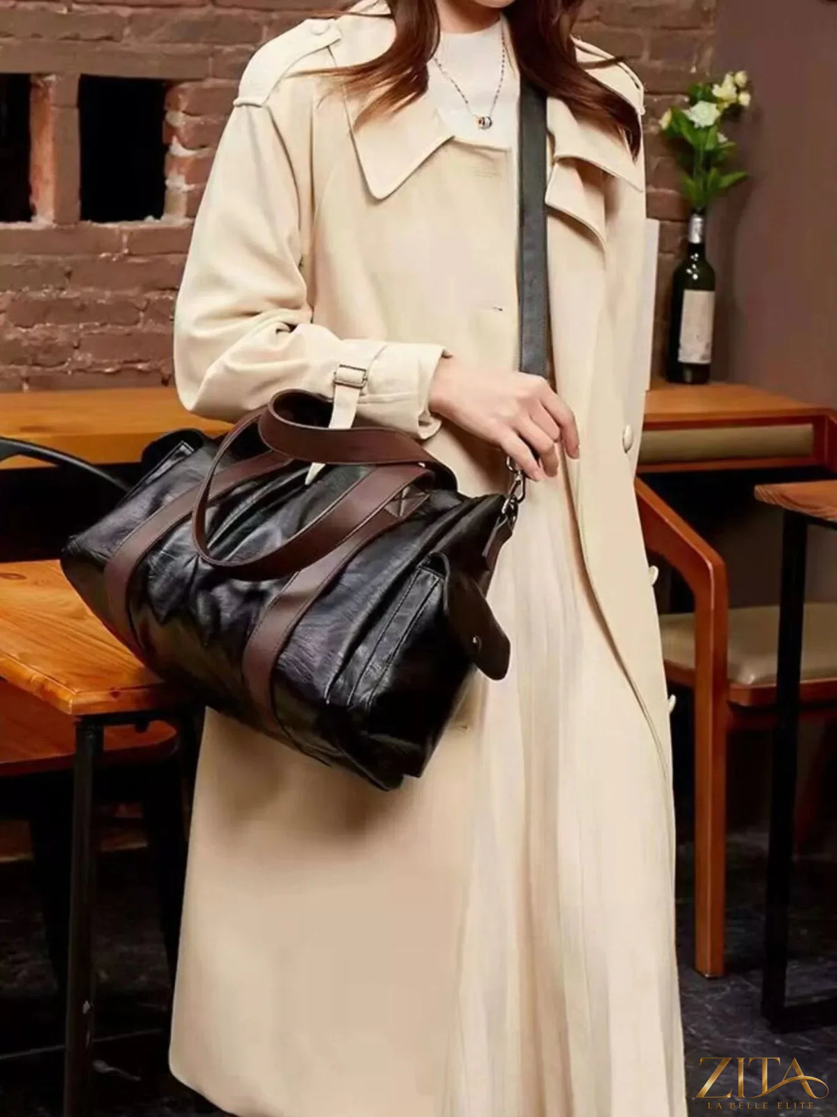 Trendsi PU leather handbag featuring a sleek, structured design with top handles and subtle stitching details.