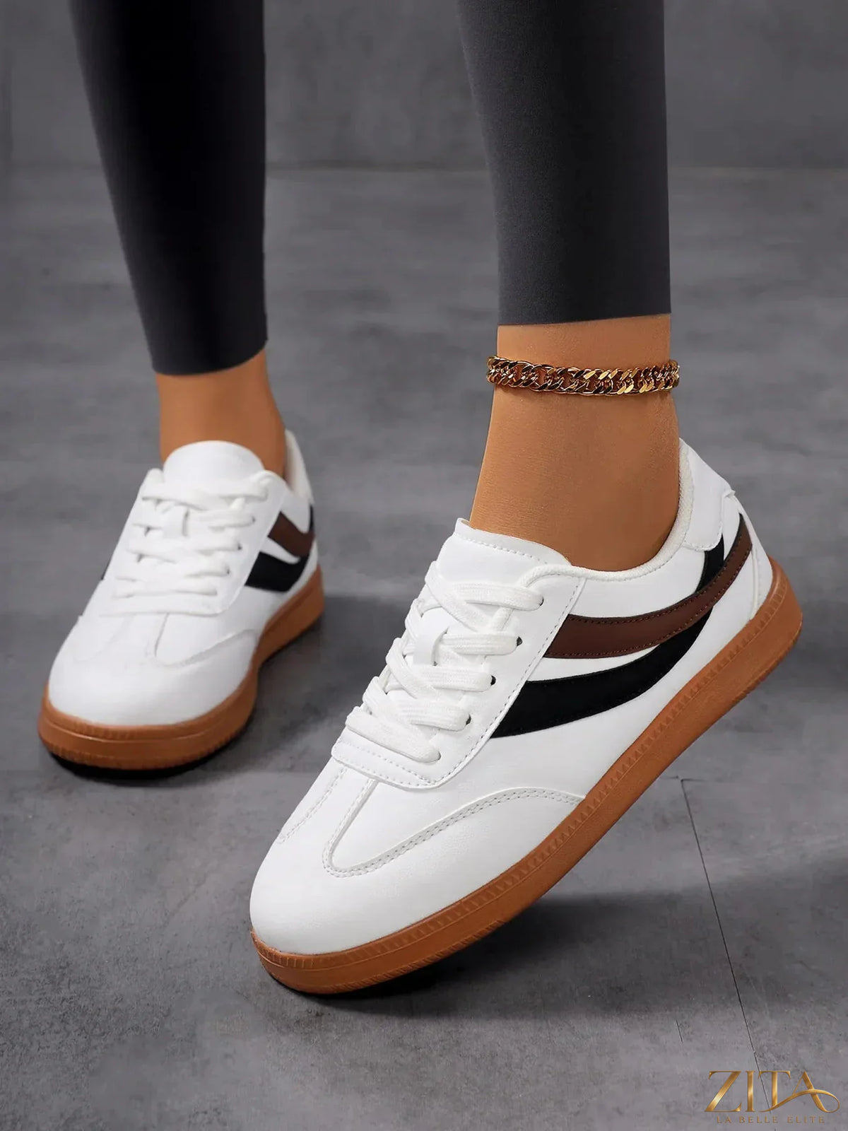 Zita La Belle Elite lace-up flat sneakers with stripe accent, featuring a stylish design and comfortable fit, shown on a clean background.