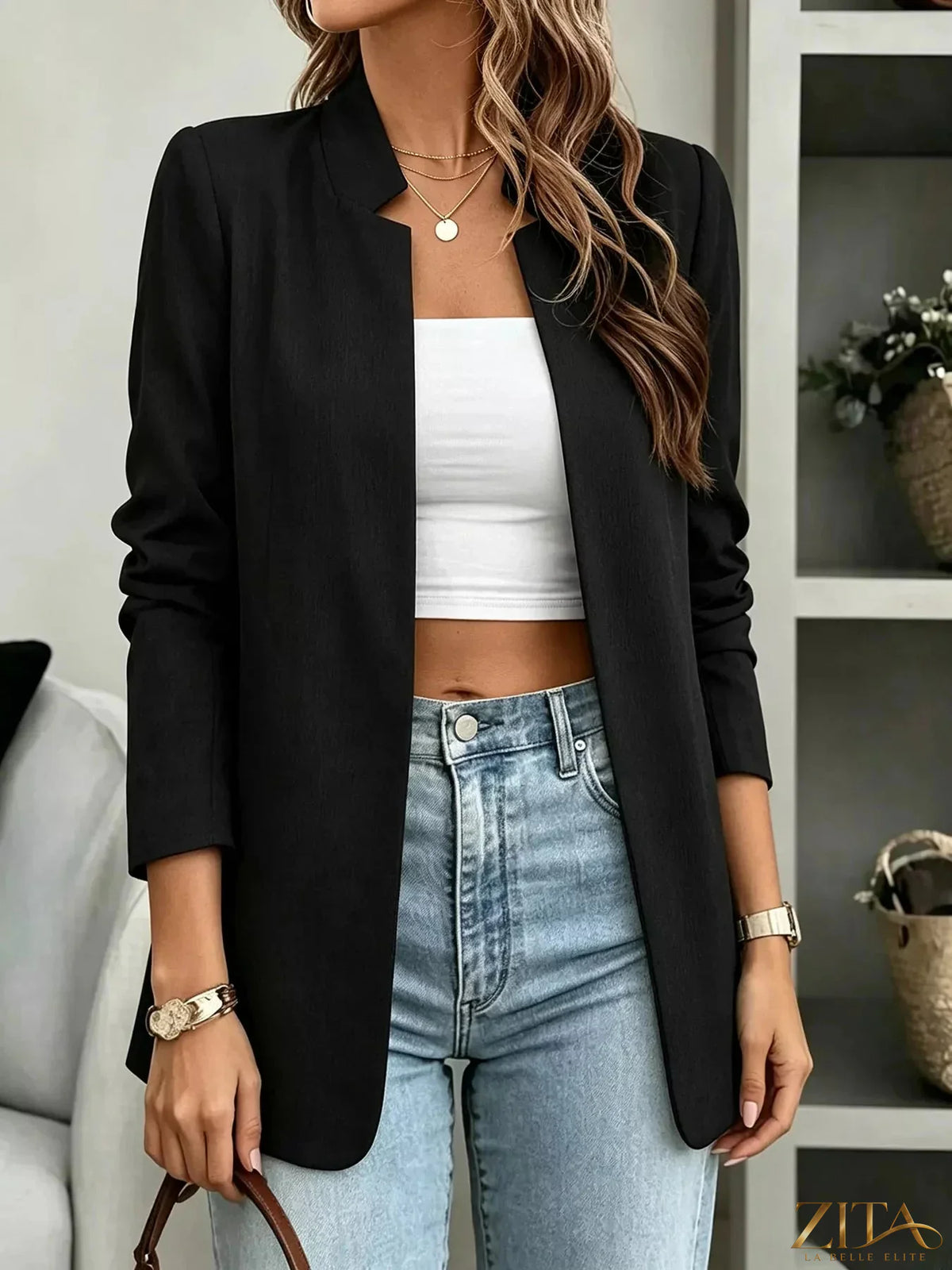 Open-front long sleeve blazer by Trendsi, styled open with a tailored fit, displayed on a model against a neutral background.