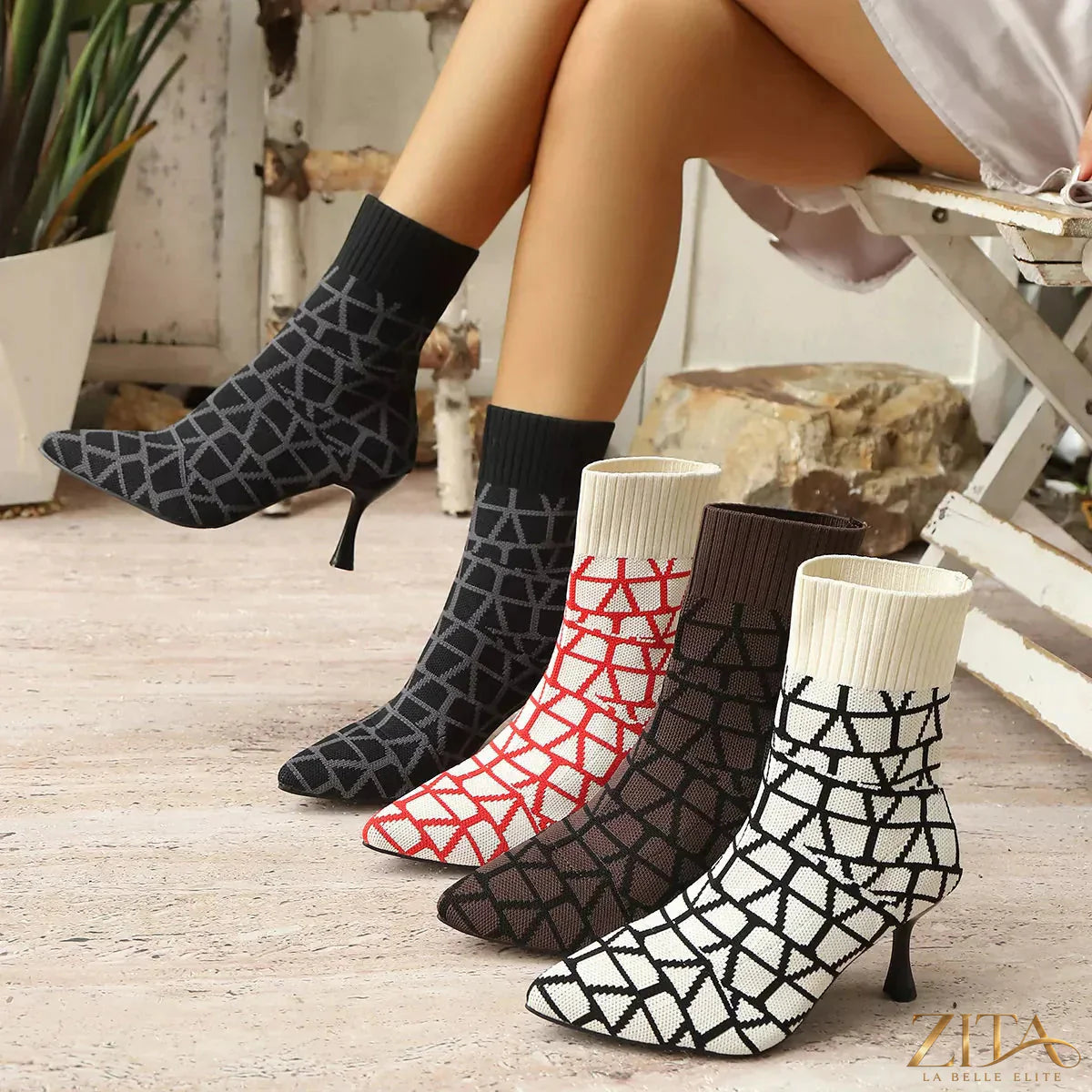 Zita La Belle Elite point toe flared heel boots in black leather with sleek design and stylish silhouette.