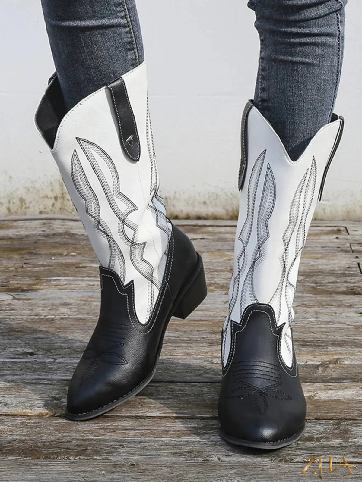 Western embroidered cowgirl boots by Trendsi featuring intricate embroidery and classic Western style.