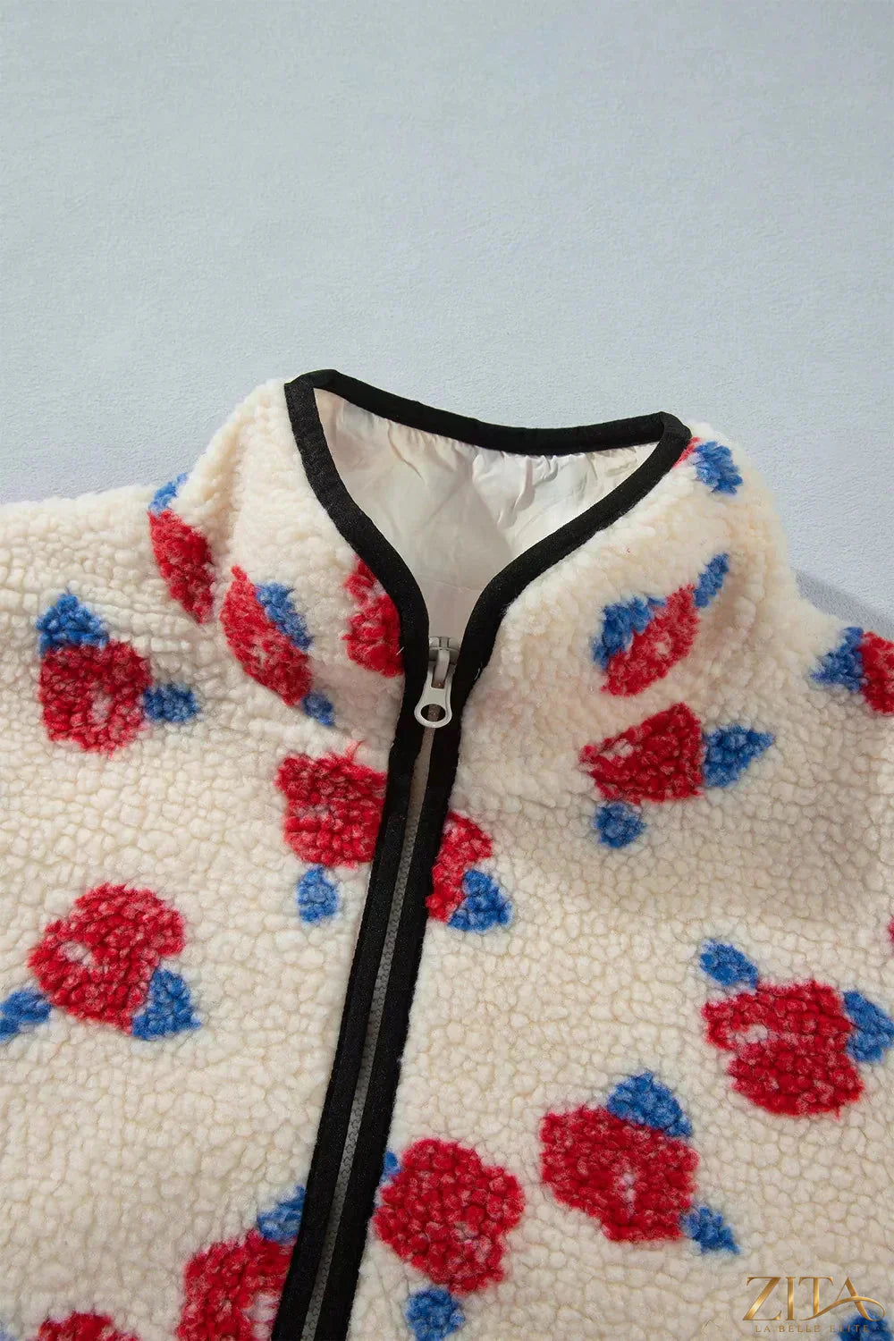 Zita La Belle Elite floral print zip-up fleece coat with stand neck and outerwear design, featuring vibrant floral patterns.
